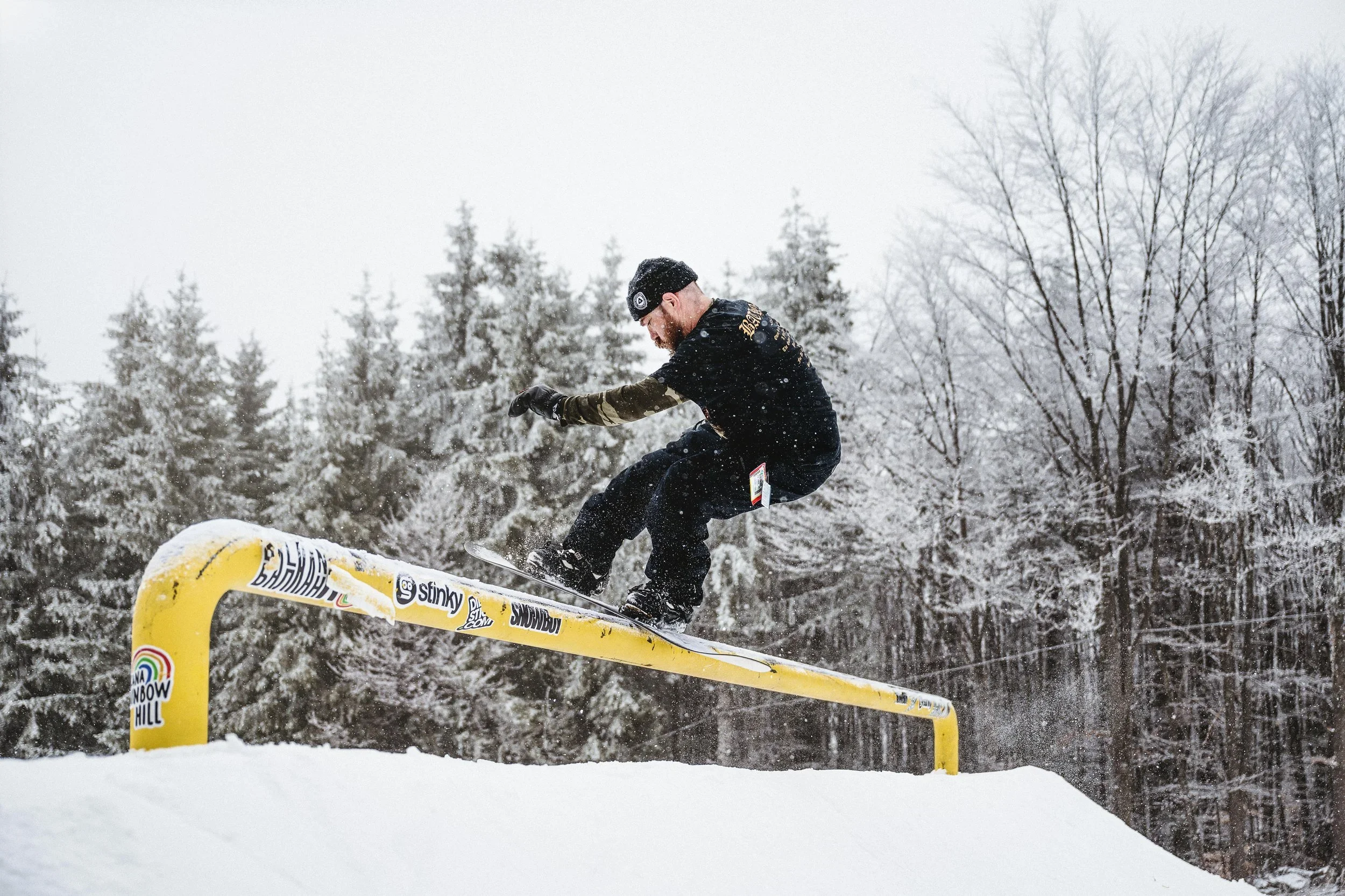 Snowboard rail competition photography - winter action sports.