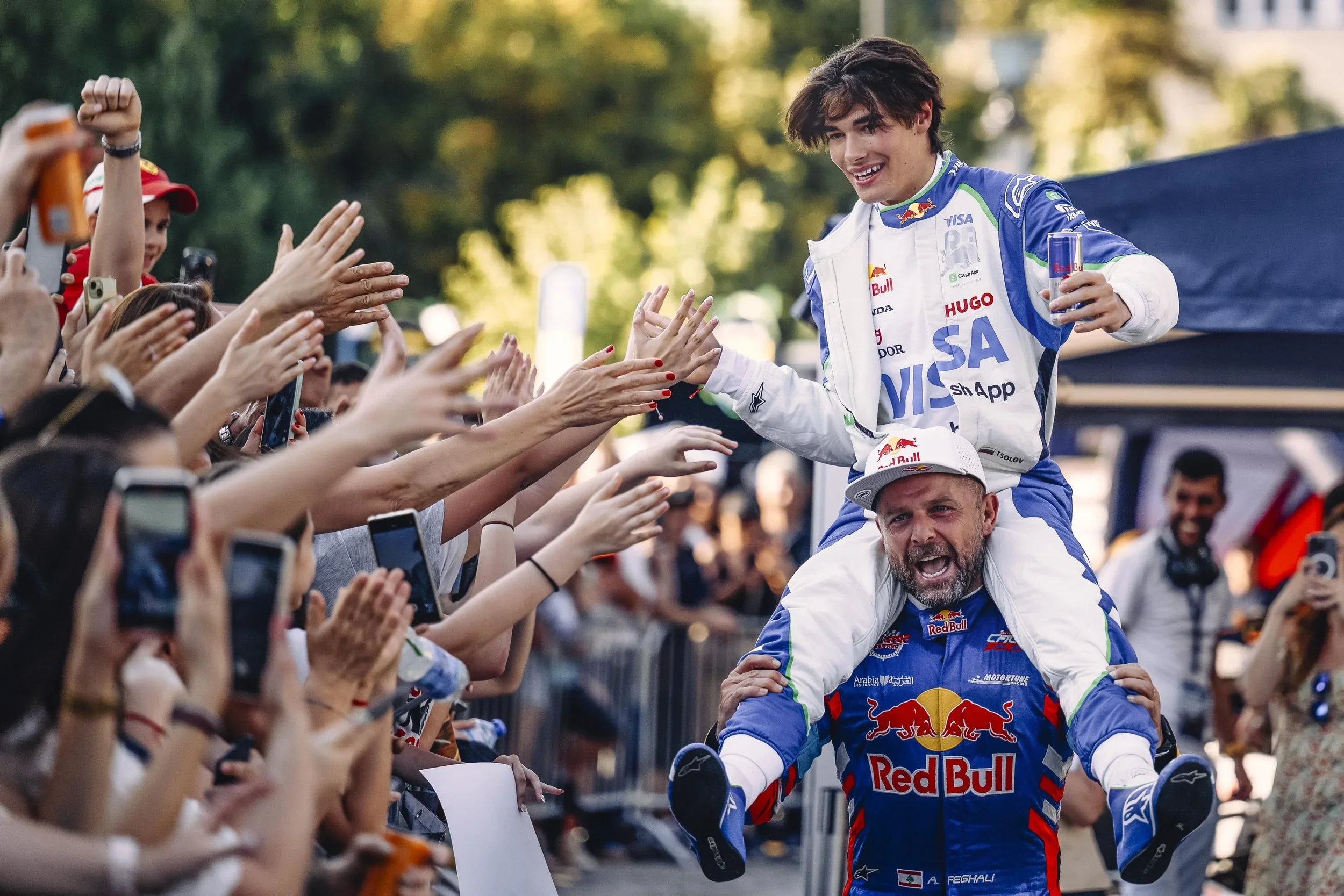 Formula 1 driver fan interaction - live brand experience photography.