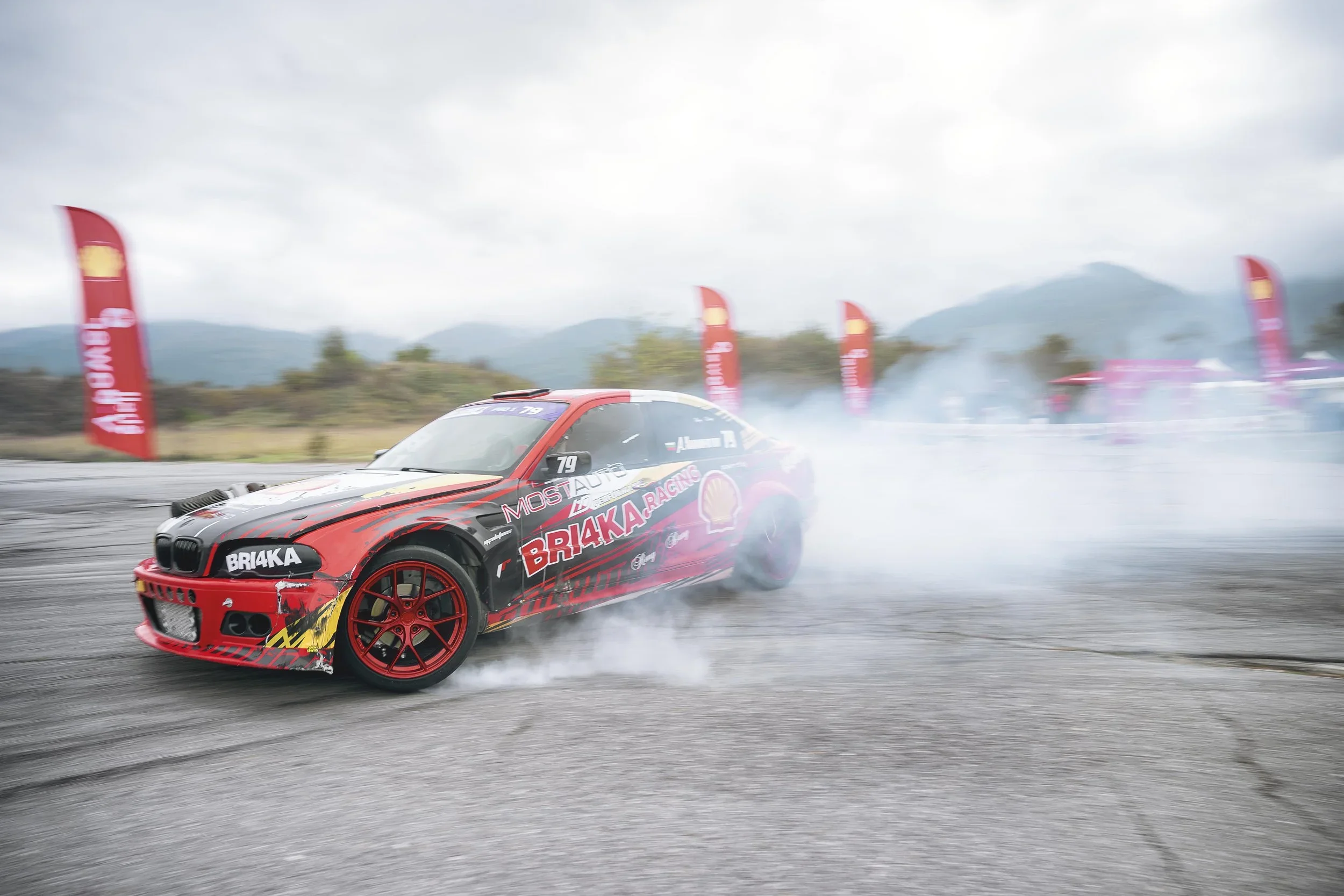 Professional drift competition photography - performance motorsport event.