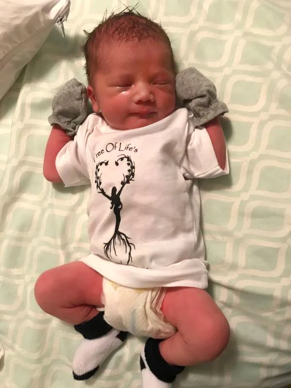 babywithgloves.jpg