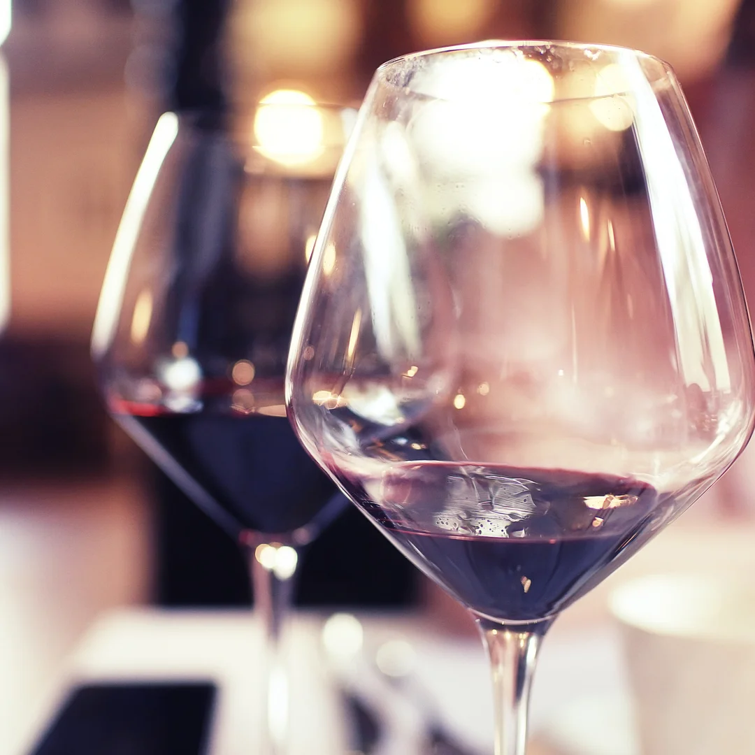 red in nice glass at bar.jpg