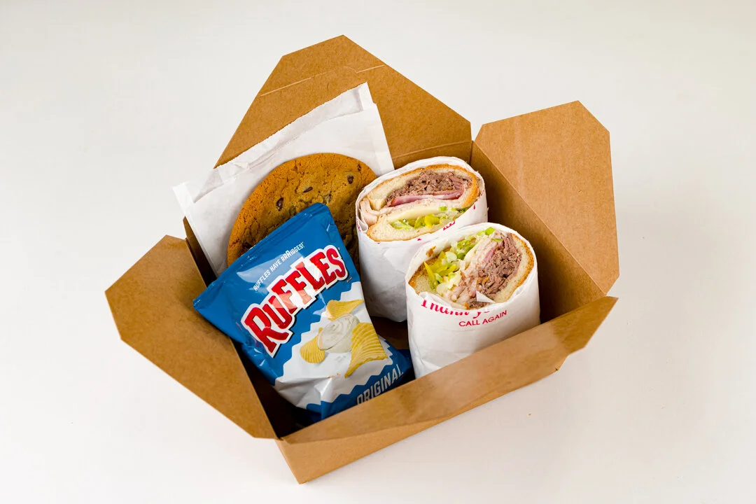 Pictured here is a Boxed Lunch with Chips and a Cookie