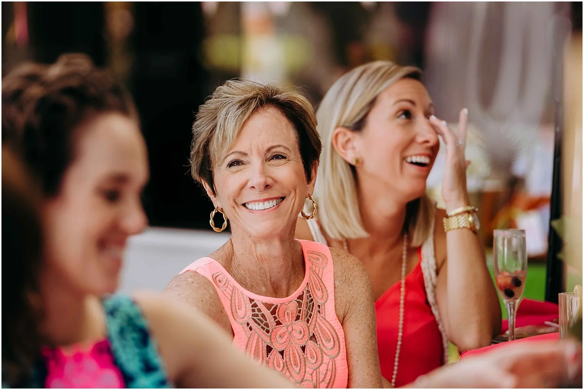 Bridal shower guest laughing
