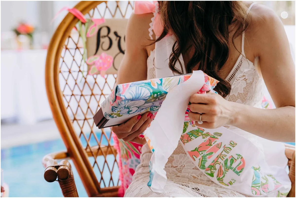 Lilly Pulitzer bride to be opening gifts