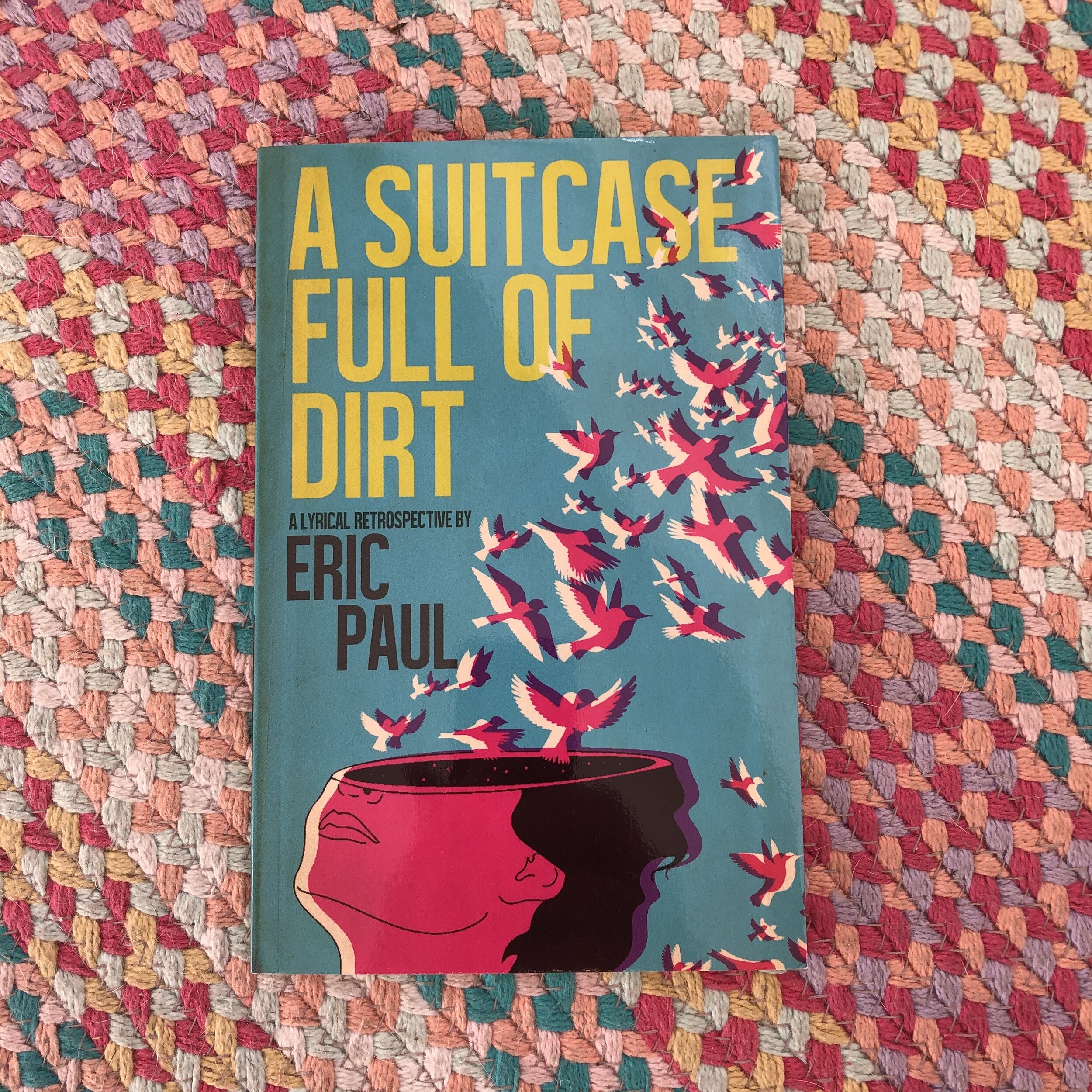 A Suitcase Full of Dirt: A Lyrical Retrospective