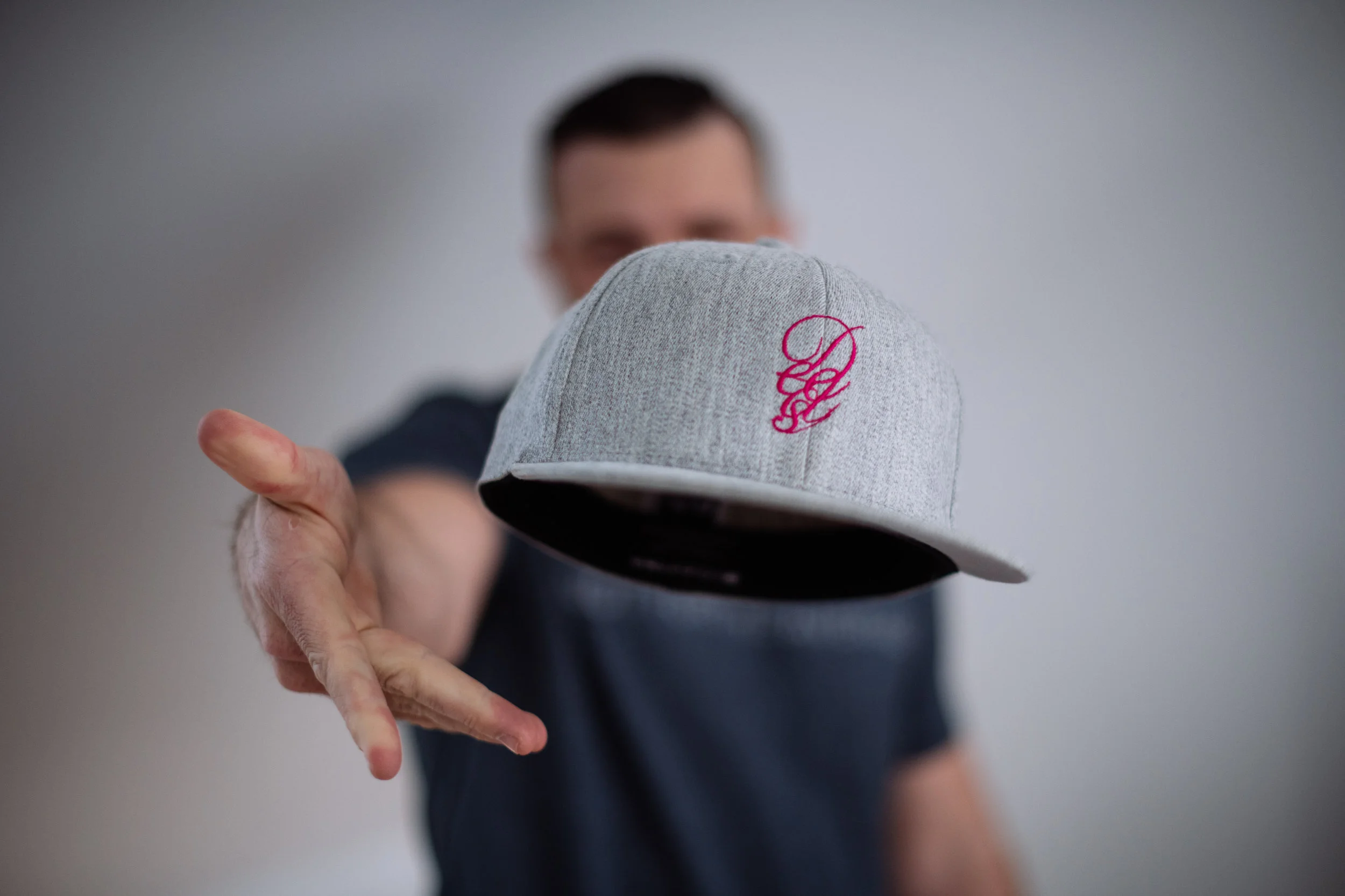 Magenta logo flex-fit snapback