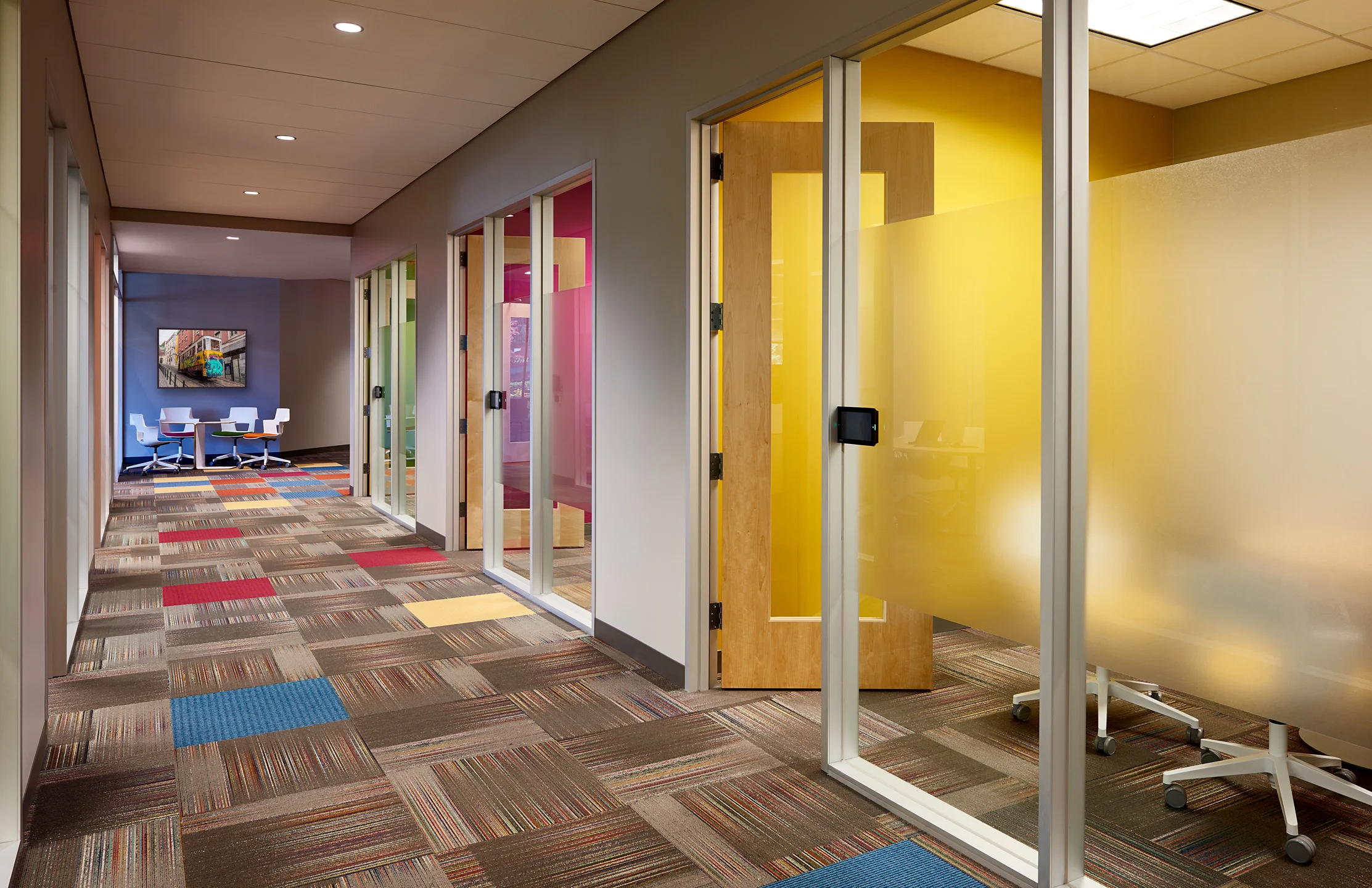 Activating internal conference spaces with energized color palettes and artificial daylighting