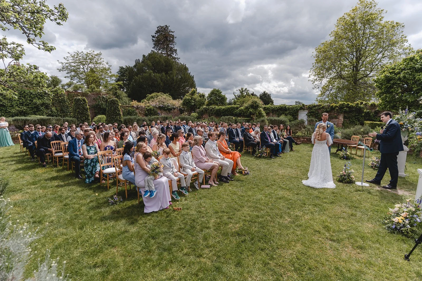 Jonny and Abi during their outdoor wedding ceremony