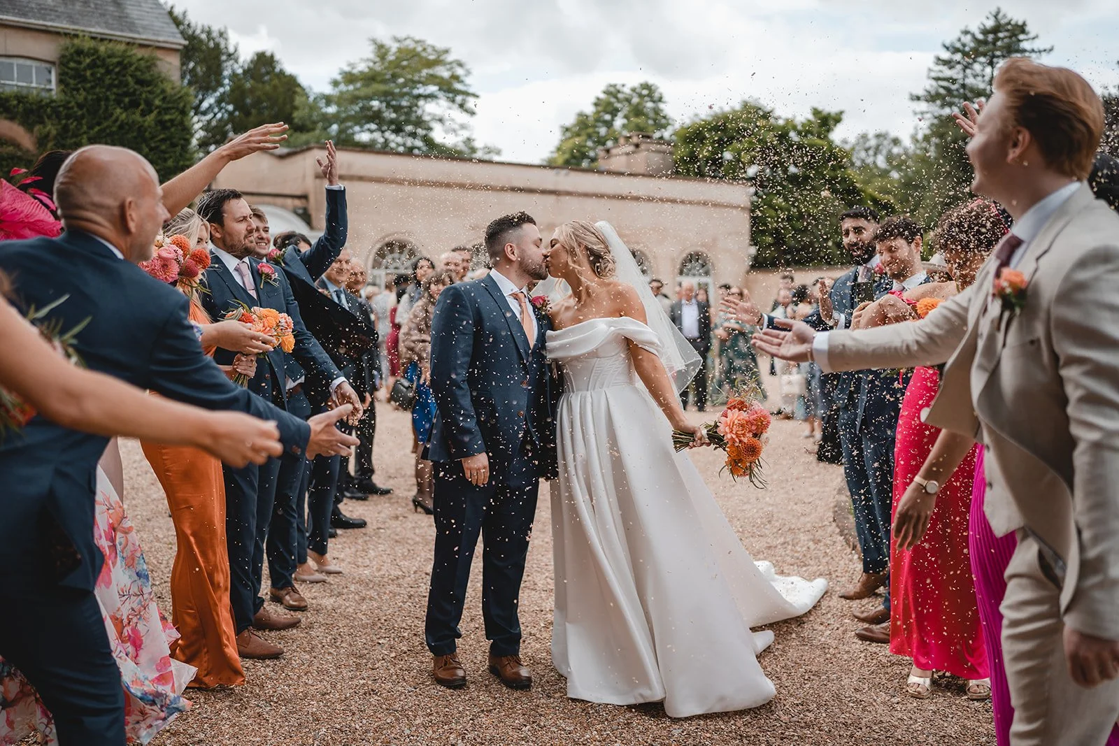 Chloe and Sina confetti wedding moment
