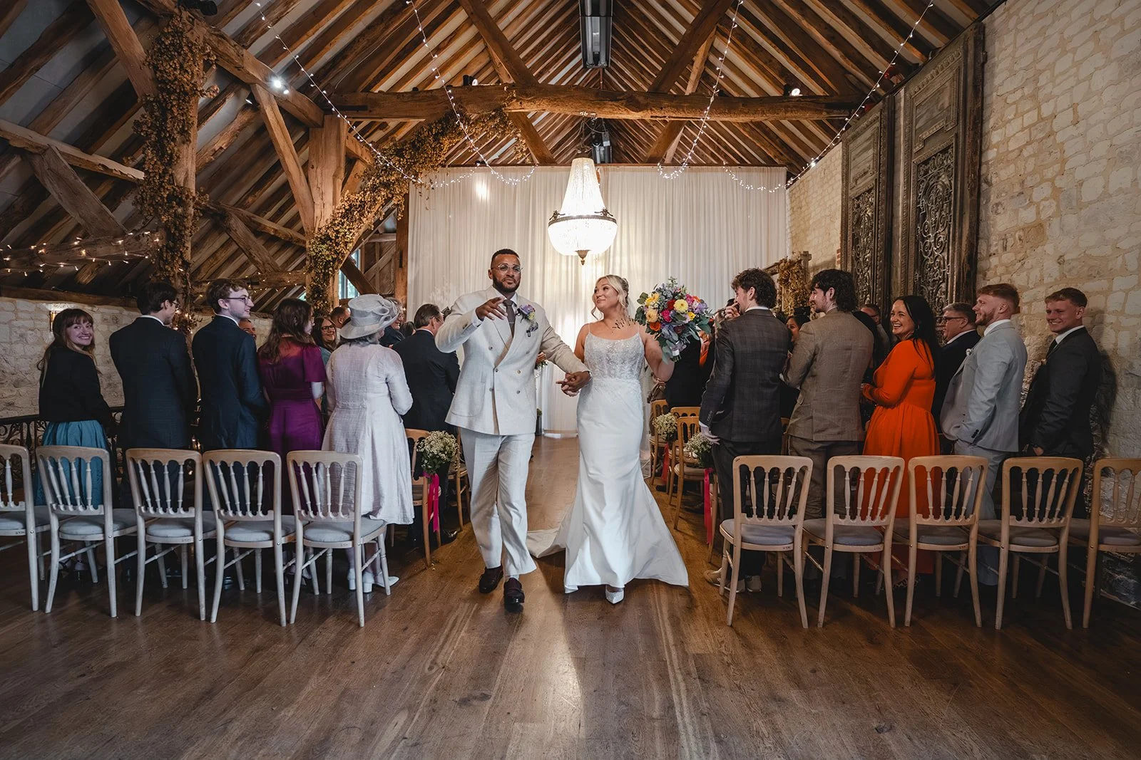 Kirsten and Josh walking back down the aisle