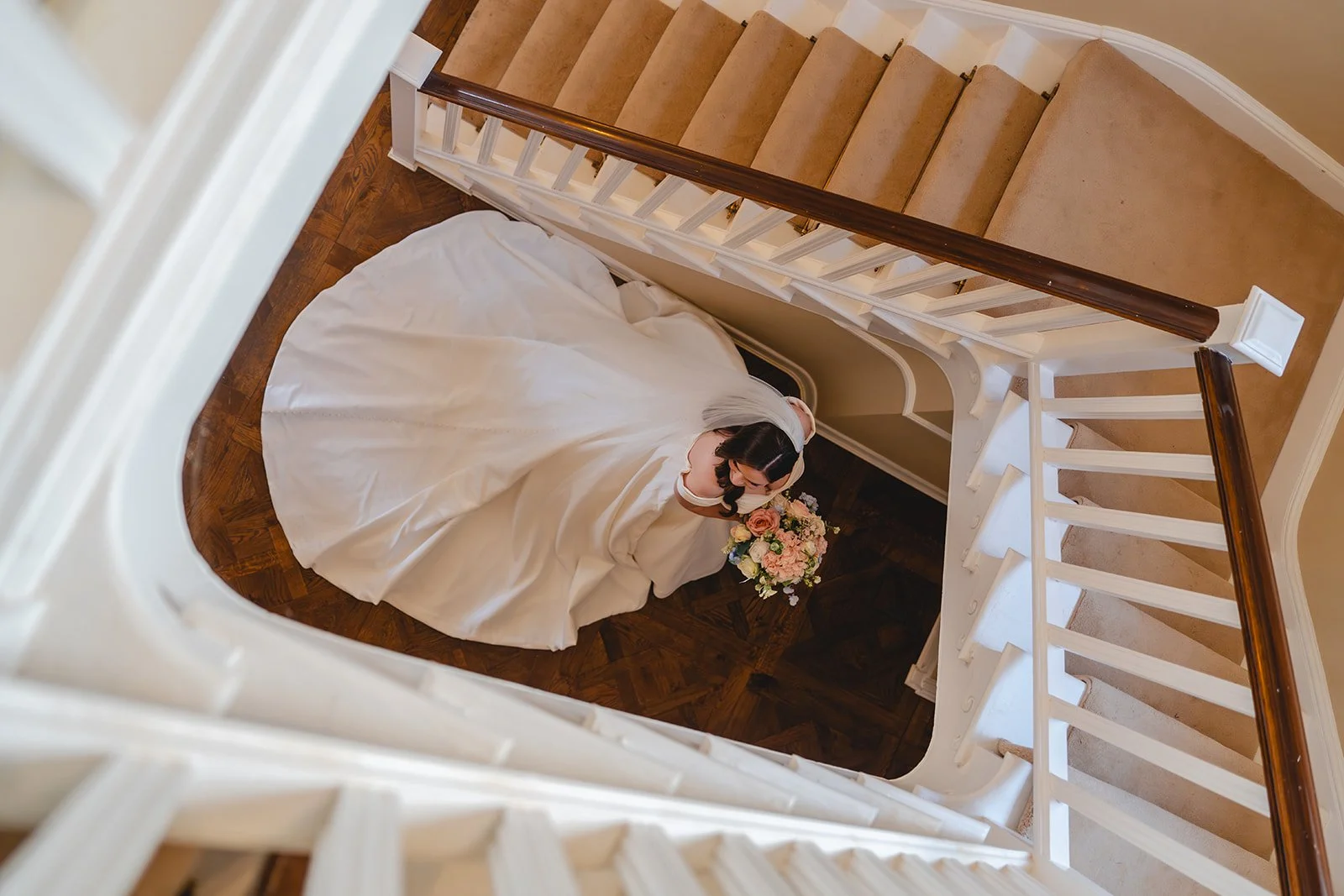 Overhead bridal portrait on staircase