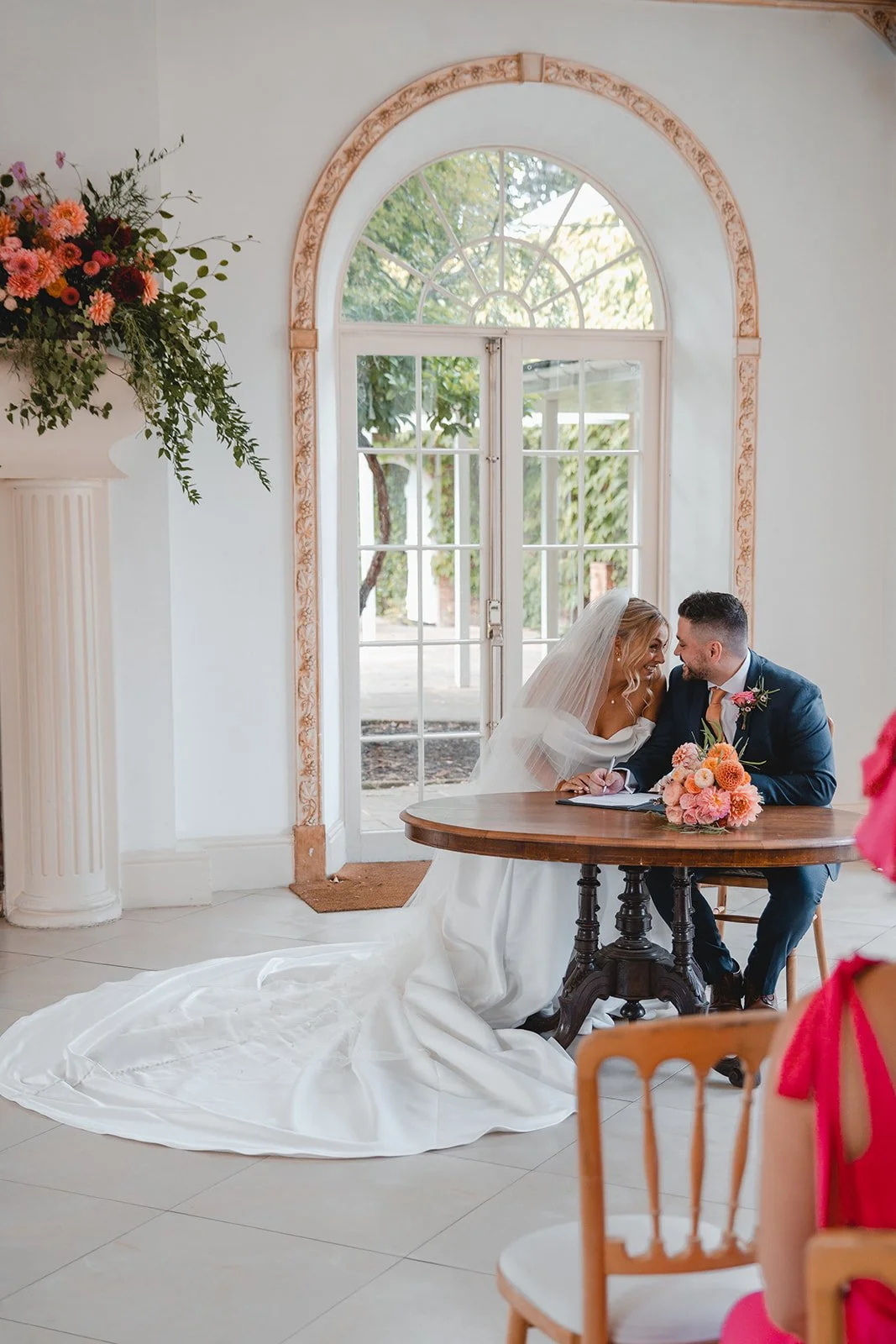 Chloe and Sina signing wedding register