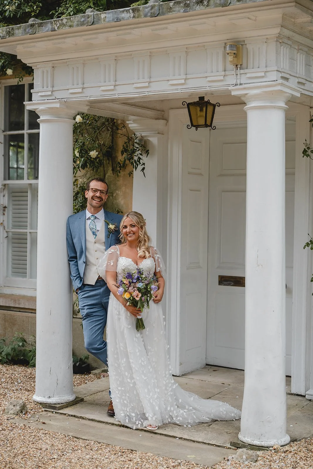 Jonny and Abi portrait outside their wedding venue