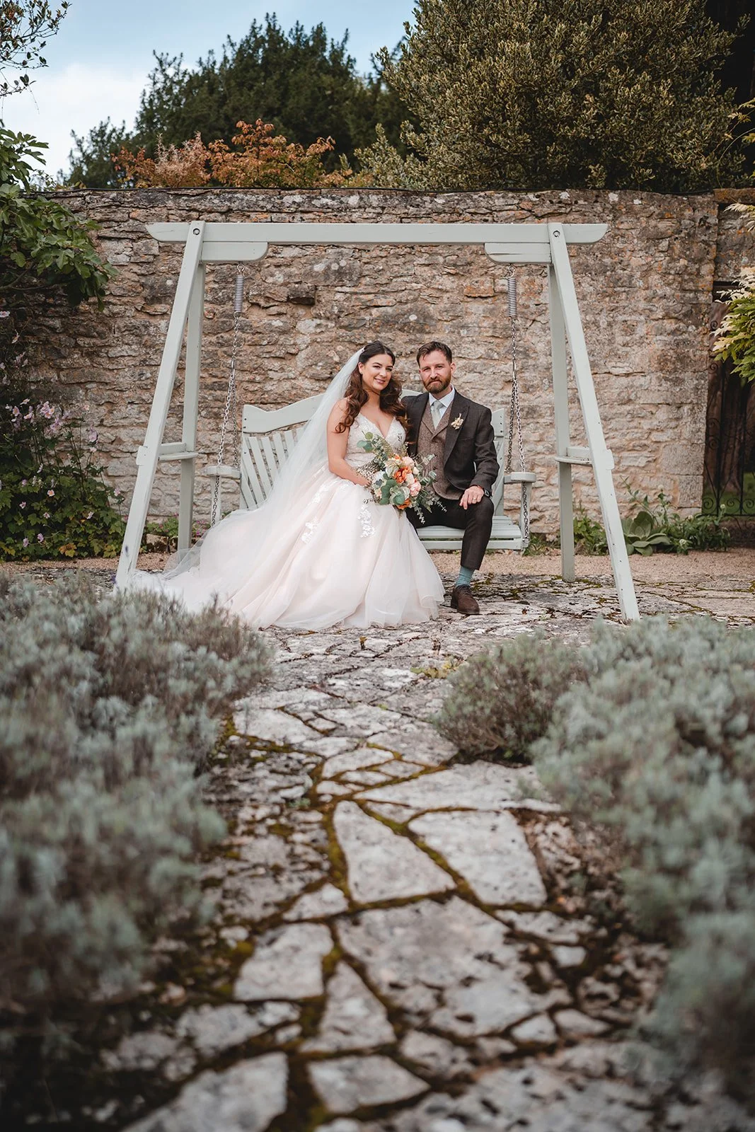 Sartis and Callum relaxed garden portrait