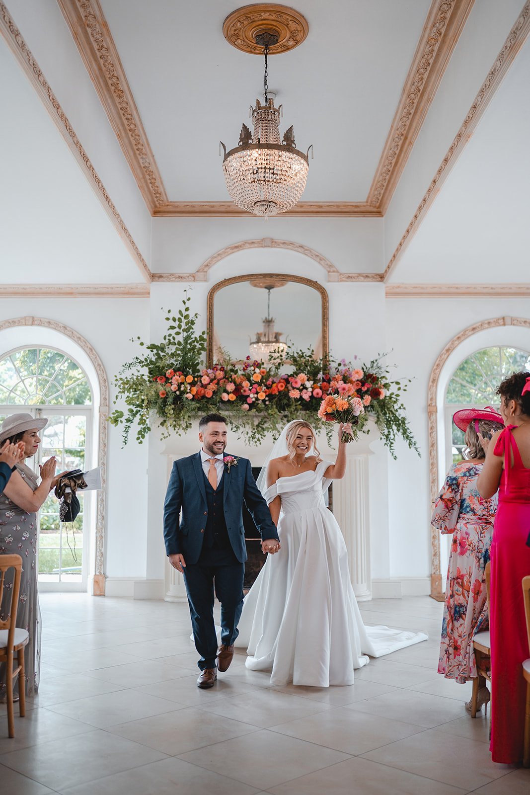 Chloe and sina walking back down the aisle