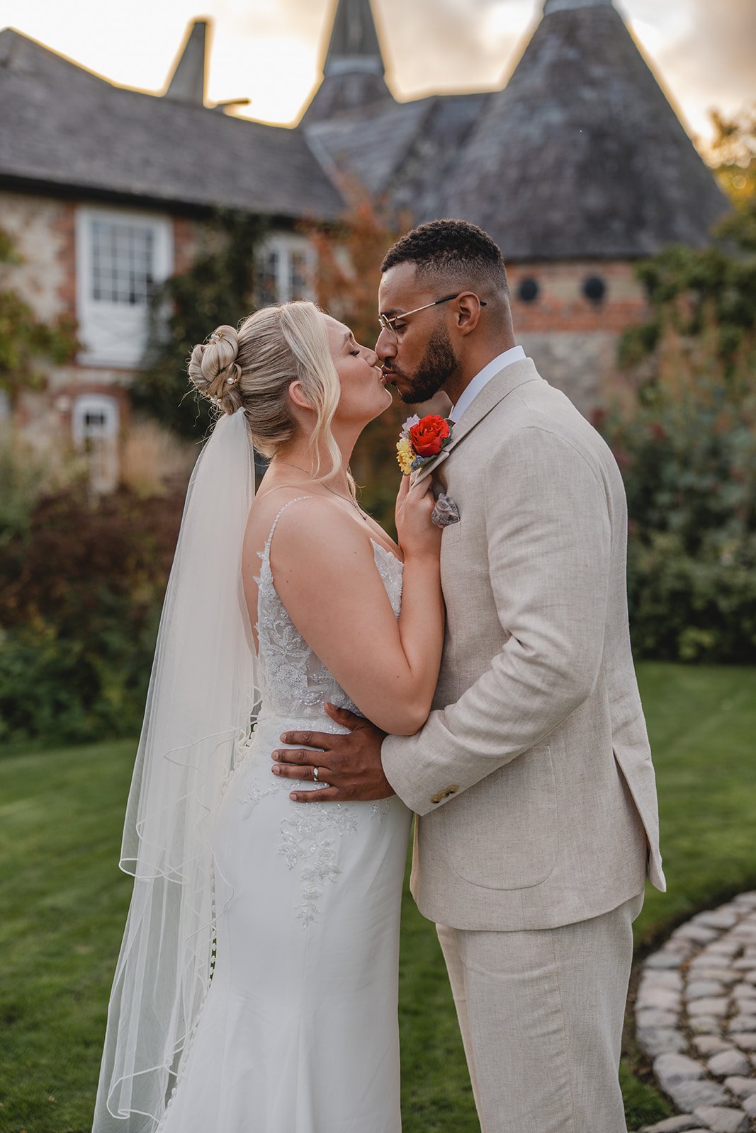 Kirsten and Josh romantic portrait outside wedding venue