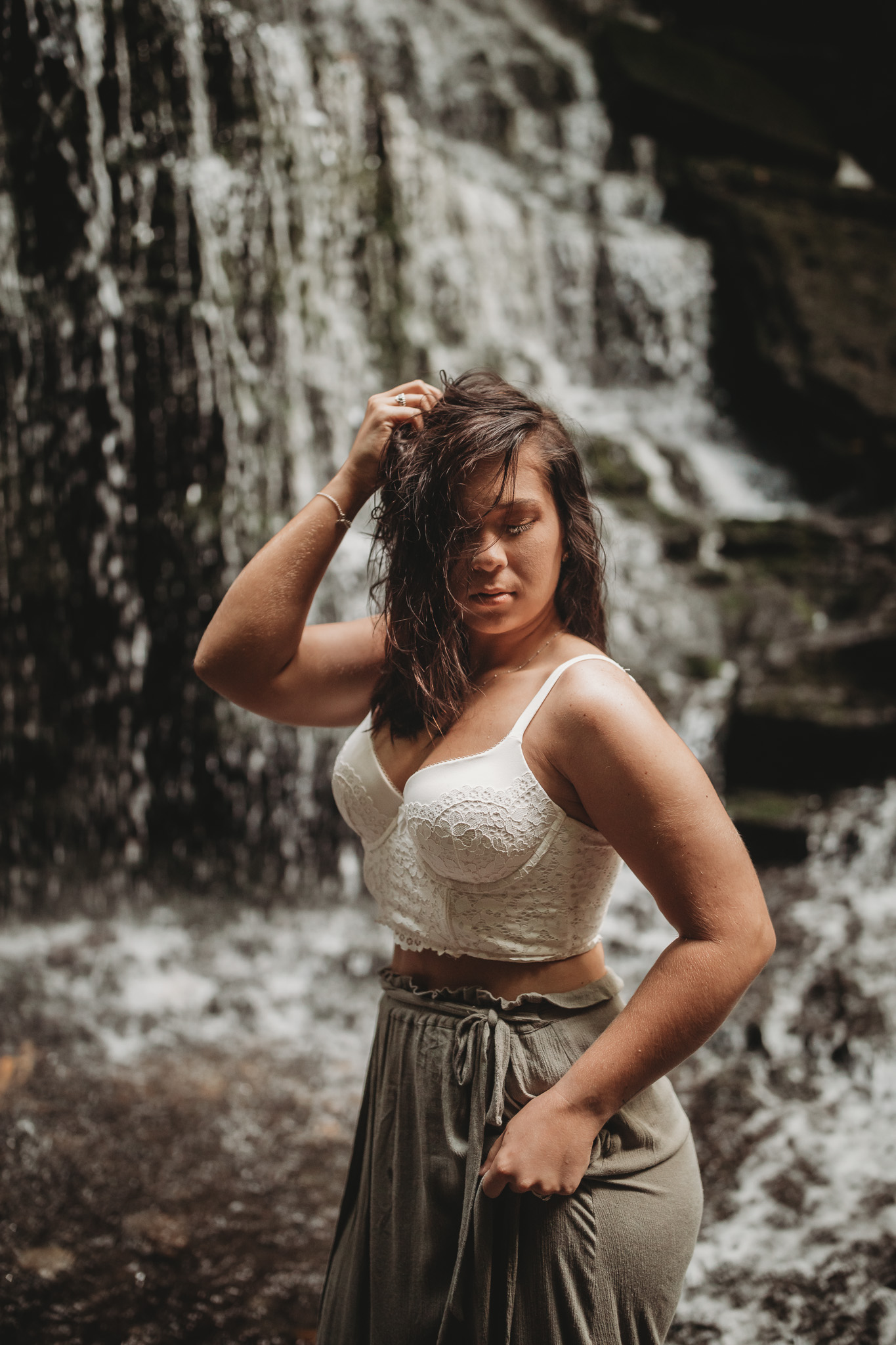 standing boudoir pose outdoors