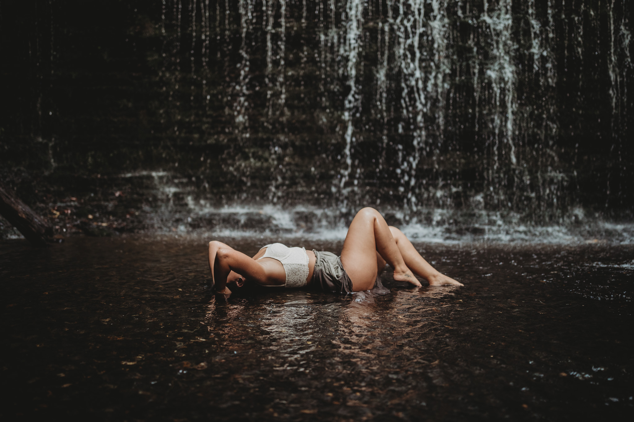 laying outdoor boudoir pose