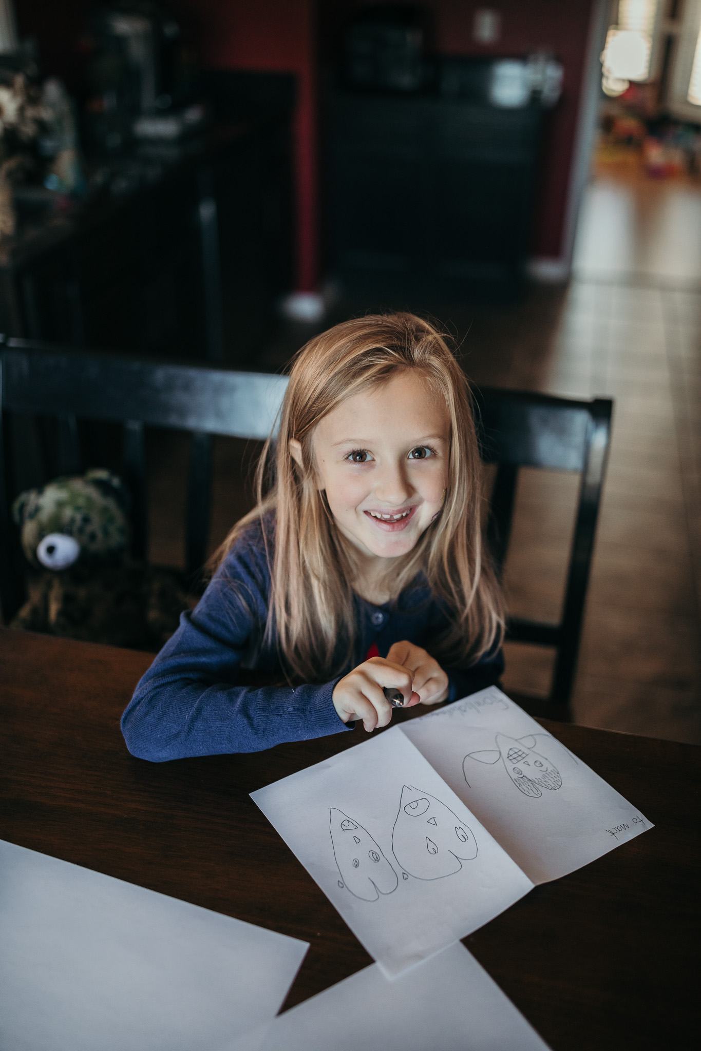 little girl writing a letter