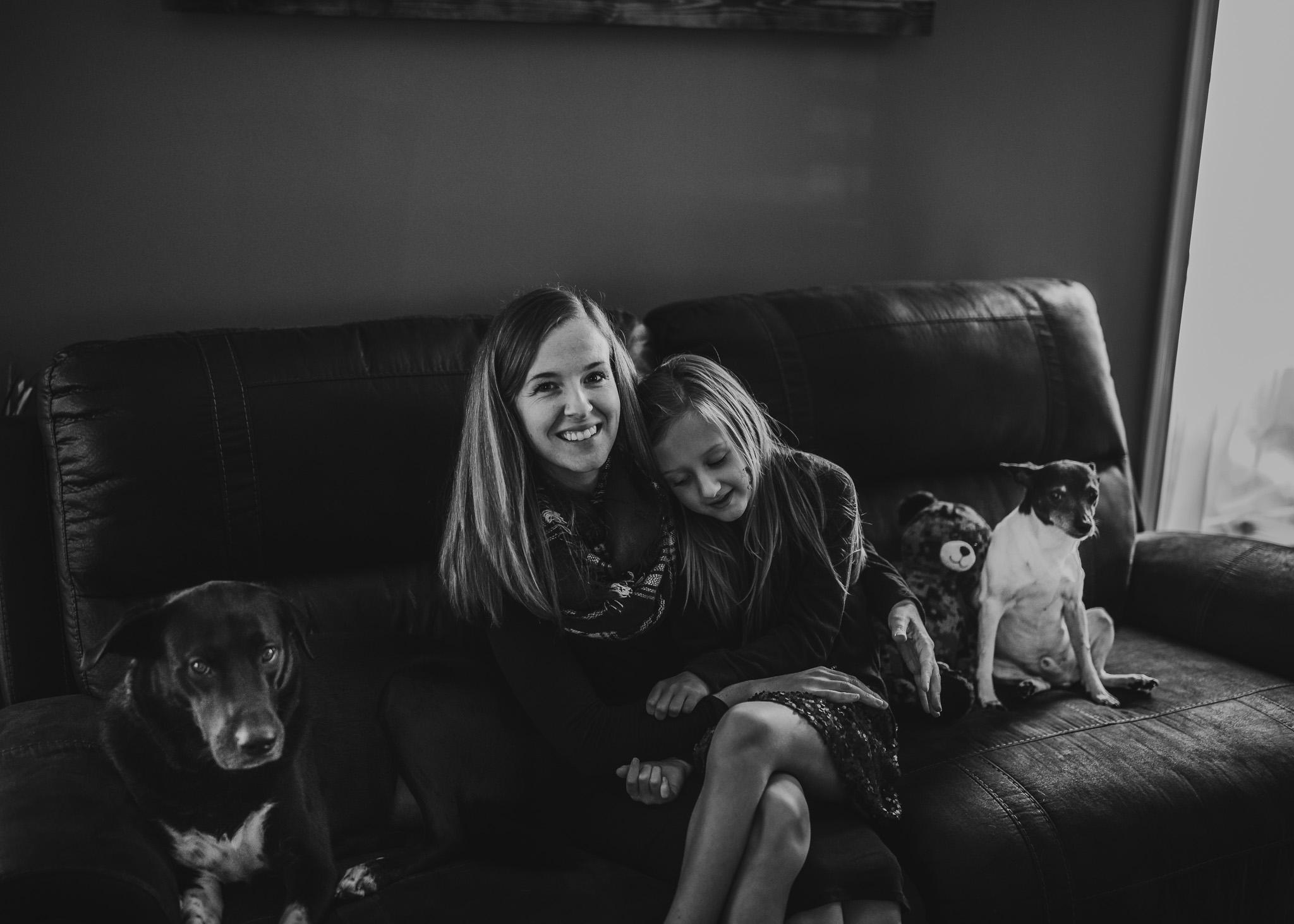 lifestyle session of mom and daughter with dogs deployed husband