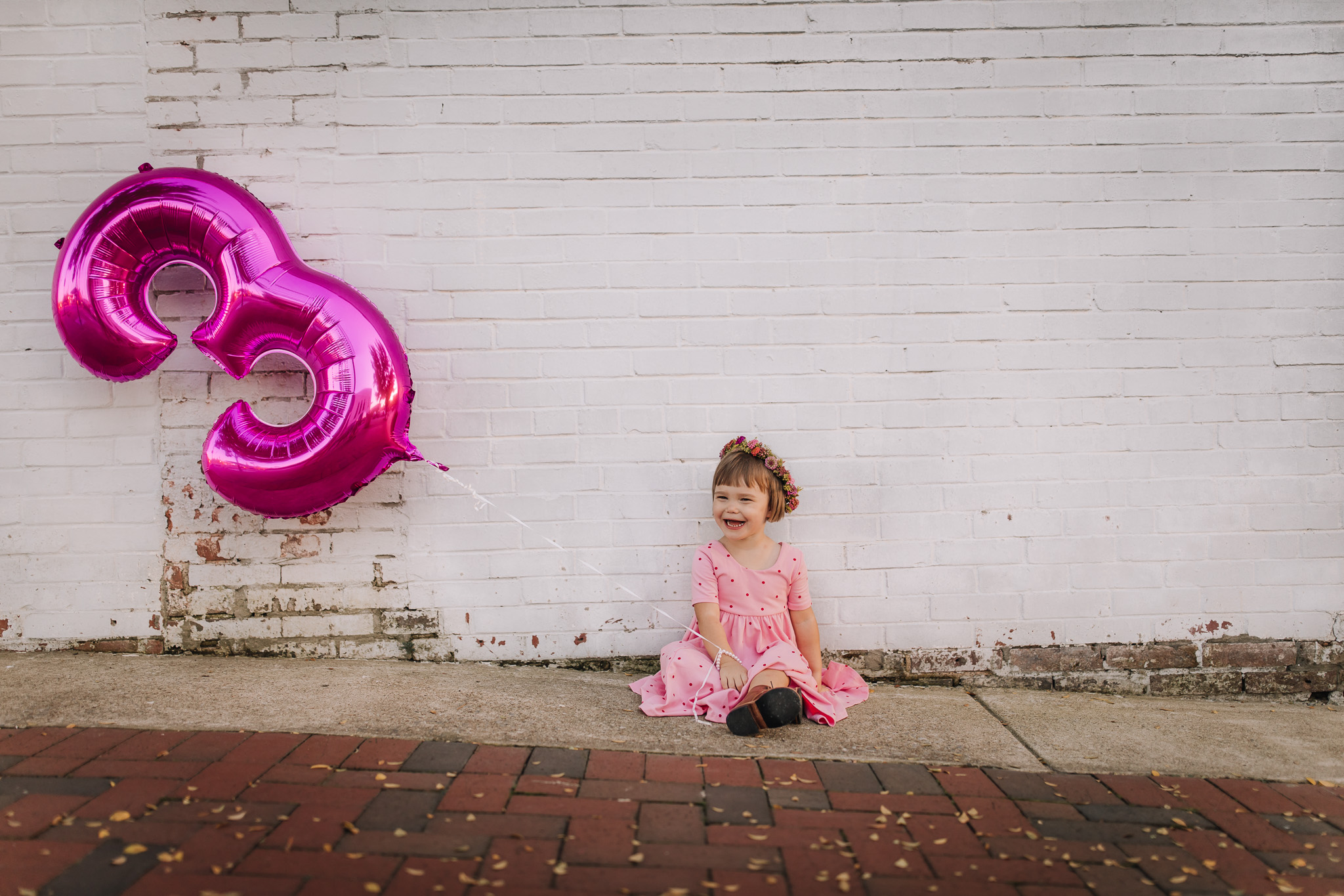 little girl and 3 balloon