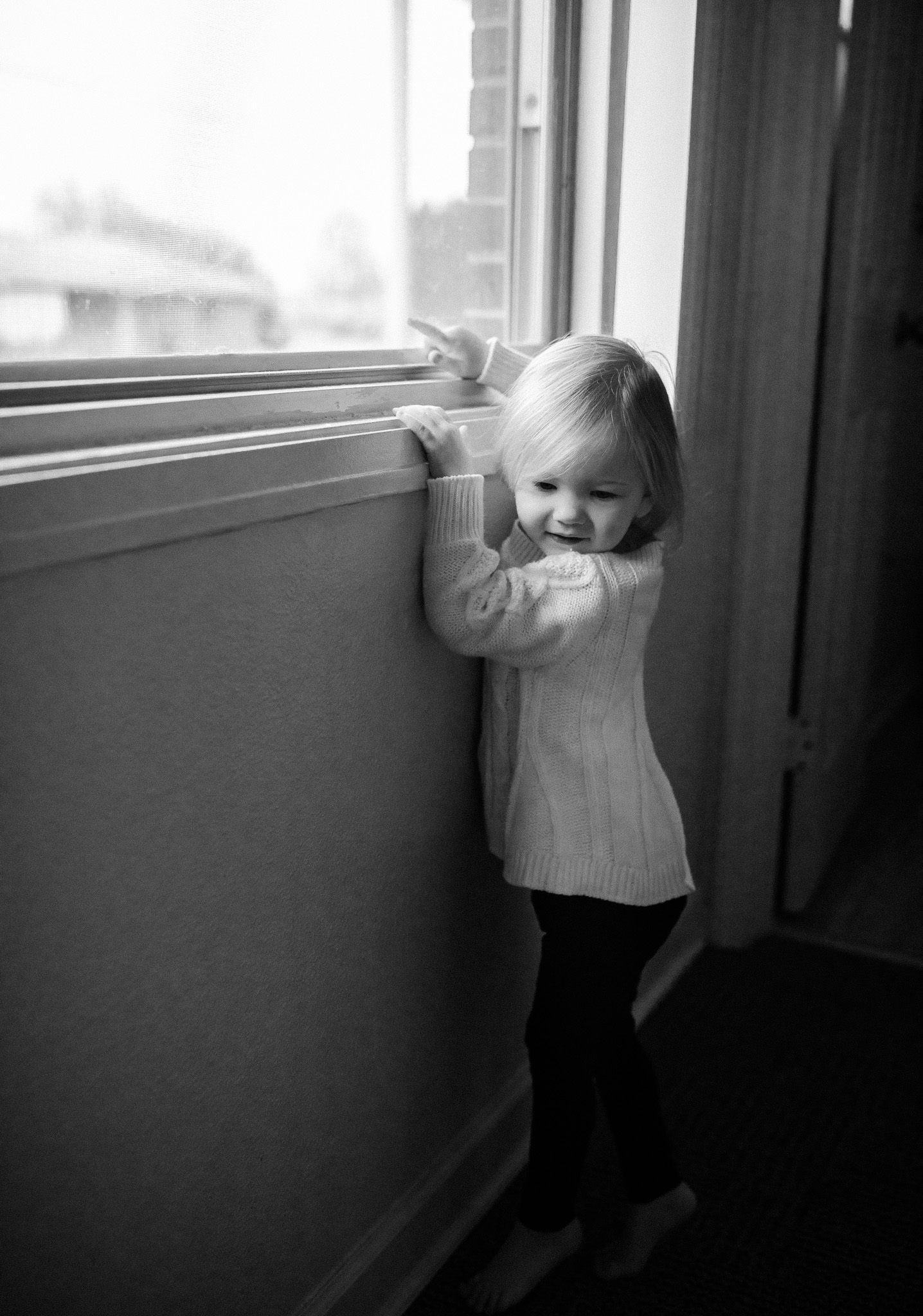 toddler at window