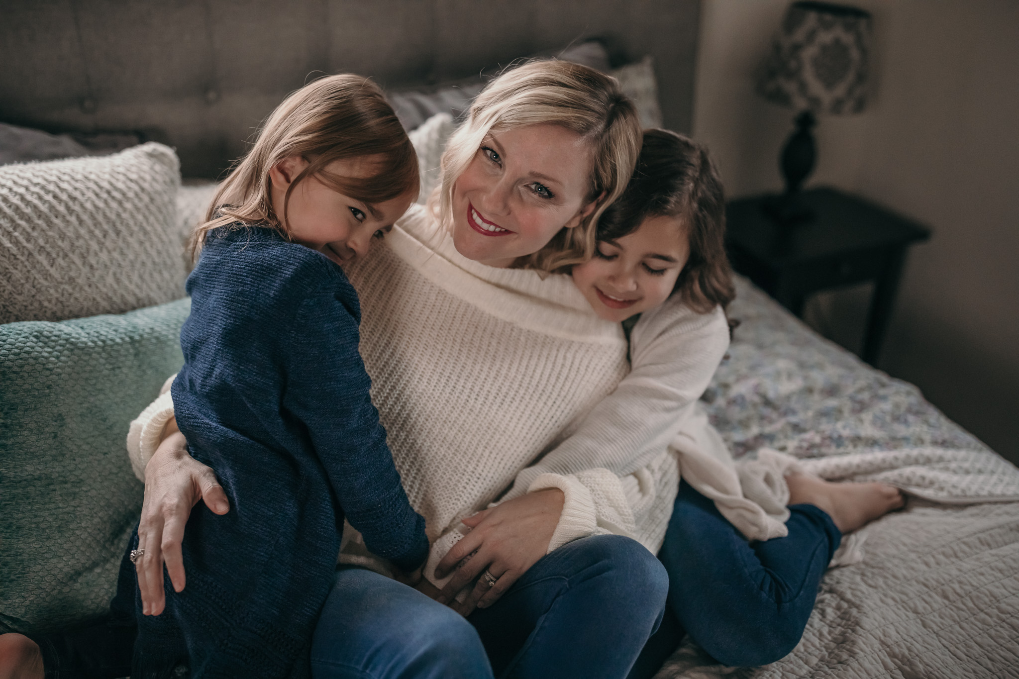 mom and her girls in home family session