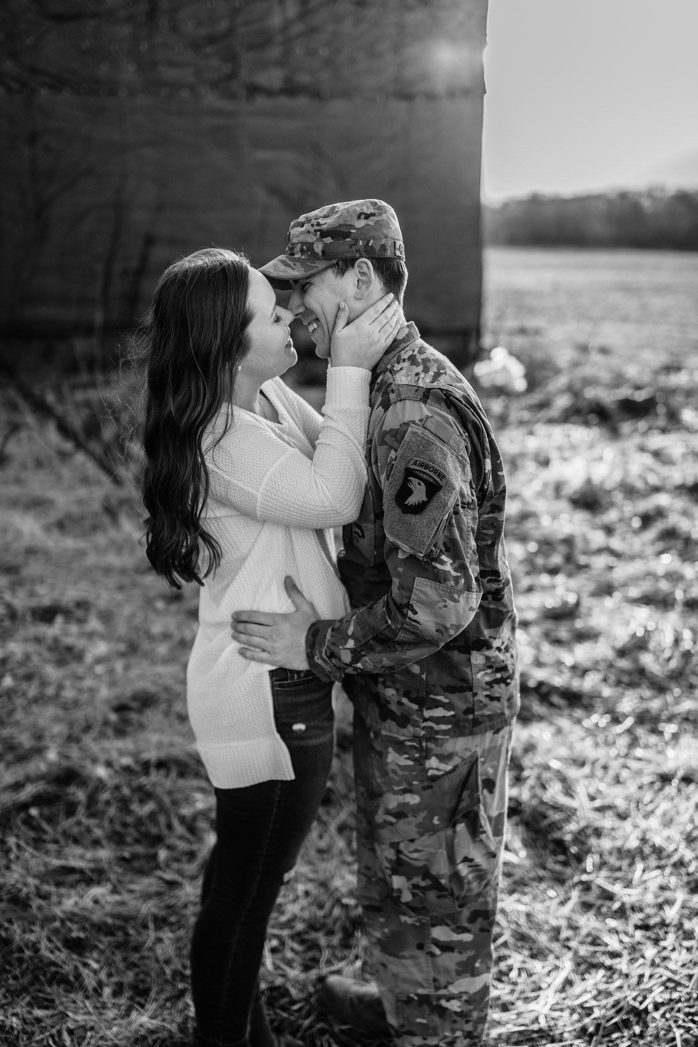 army man in uniform kissing girl