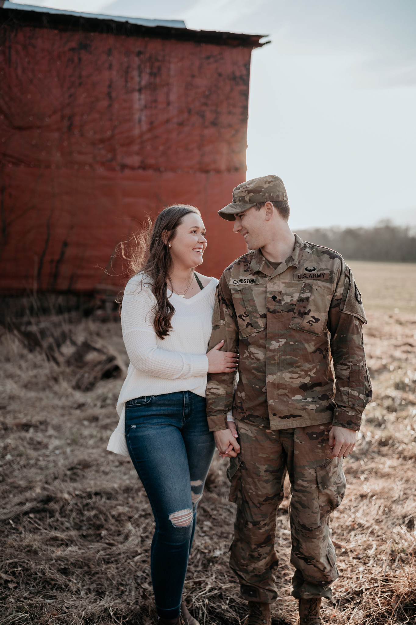 man in army uniform with girl