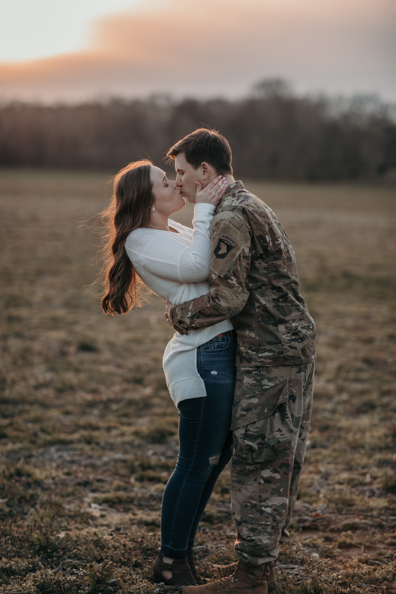  couple kissing in uniform army