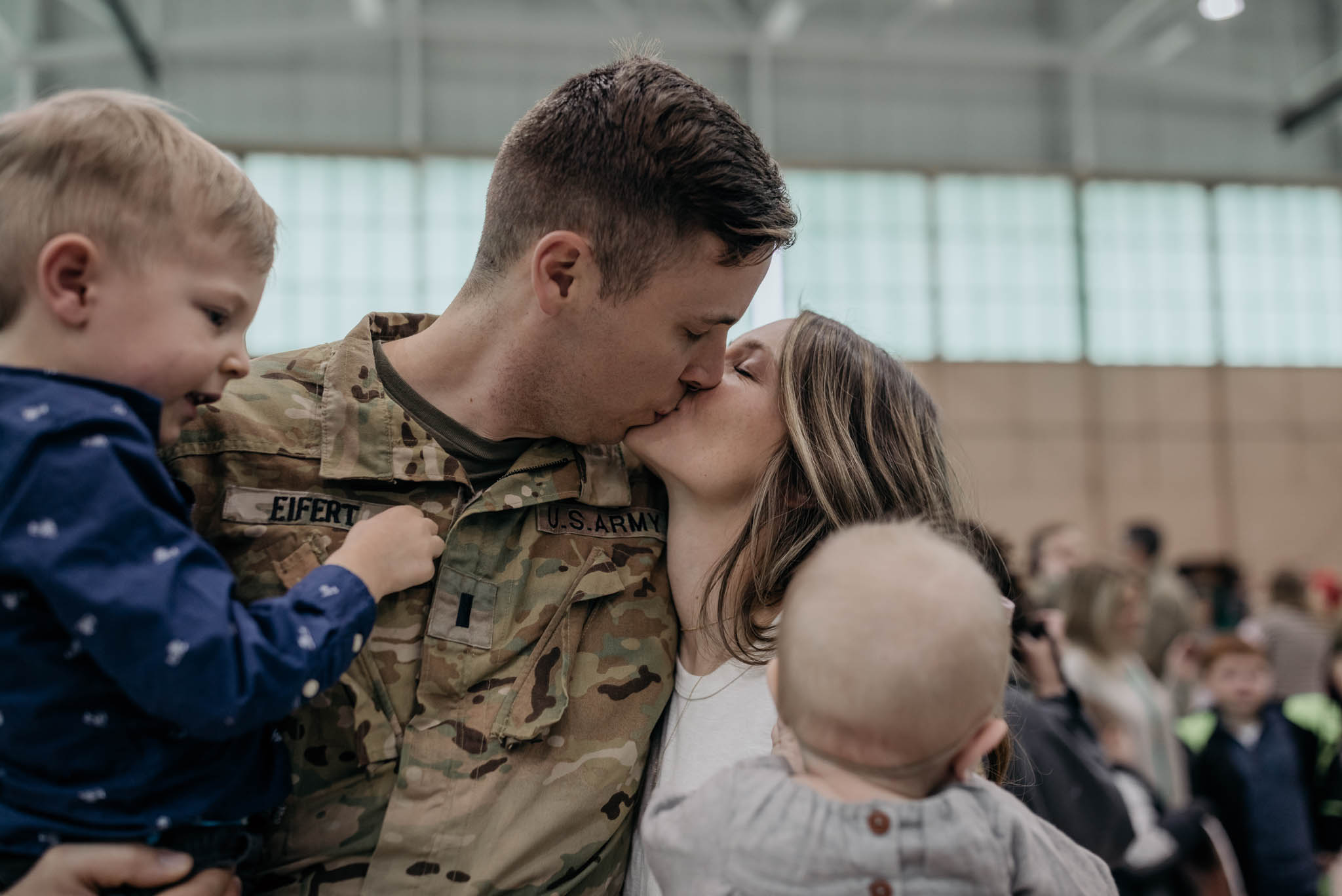 Soldier and Wife Share a Kiss