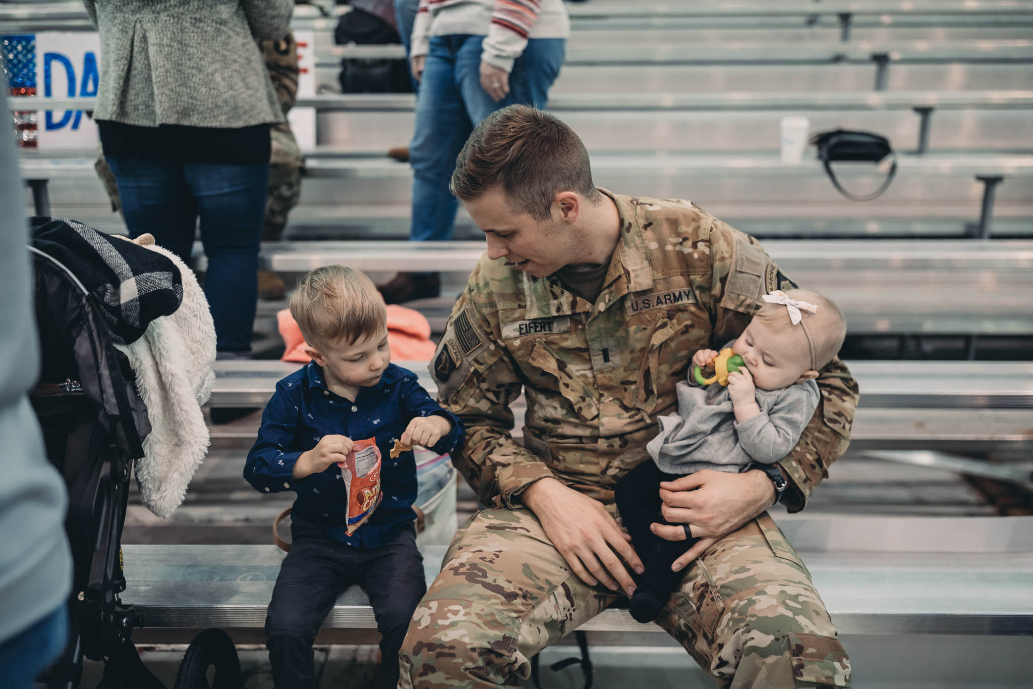 Soldier Sitting with Children