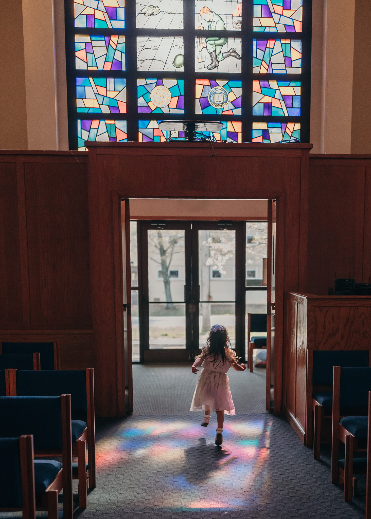 Flower Girl Running down Isle