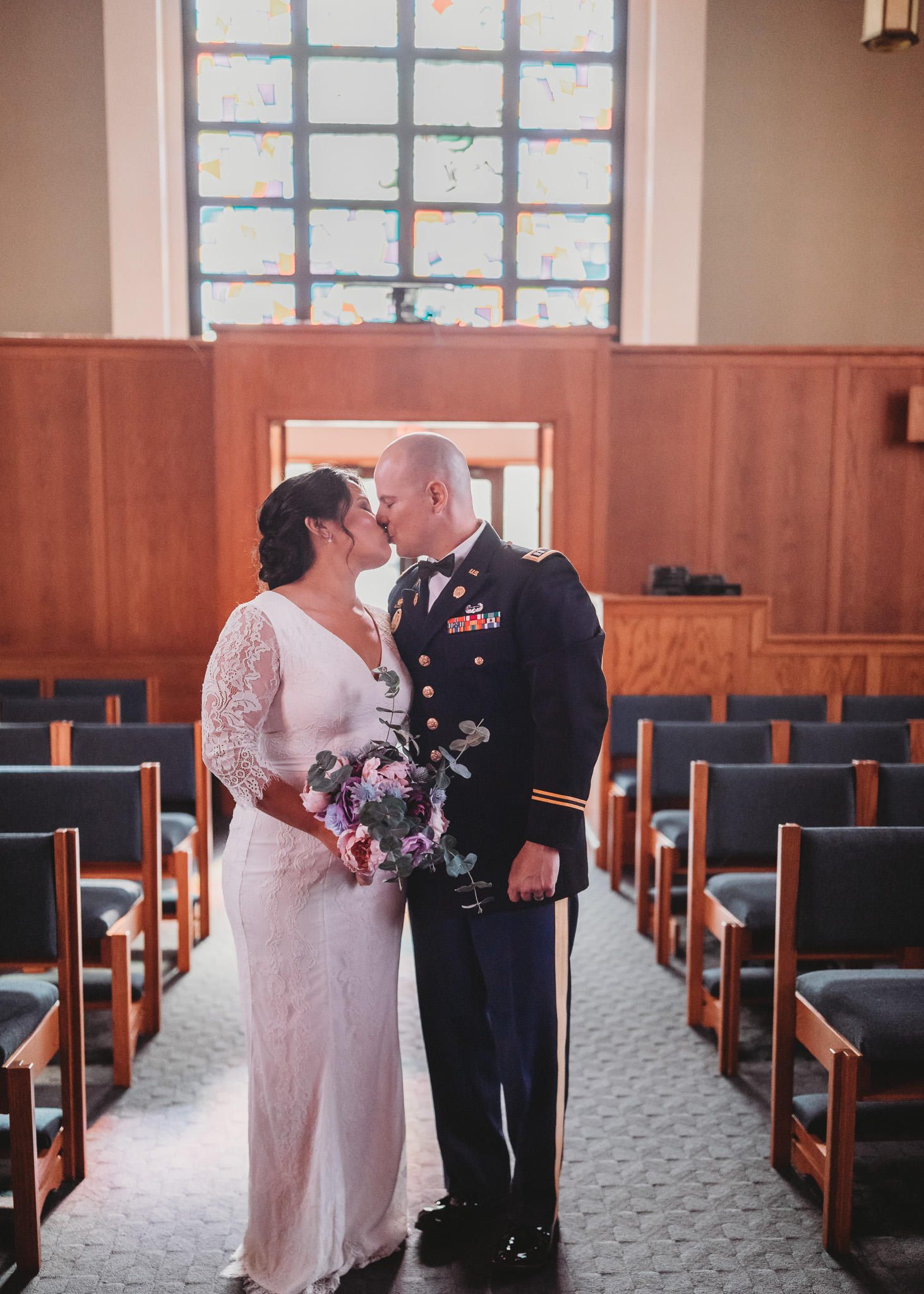 Bride and Groom Sharing a Kiss