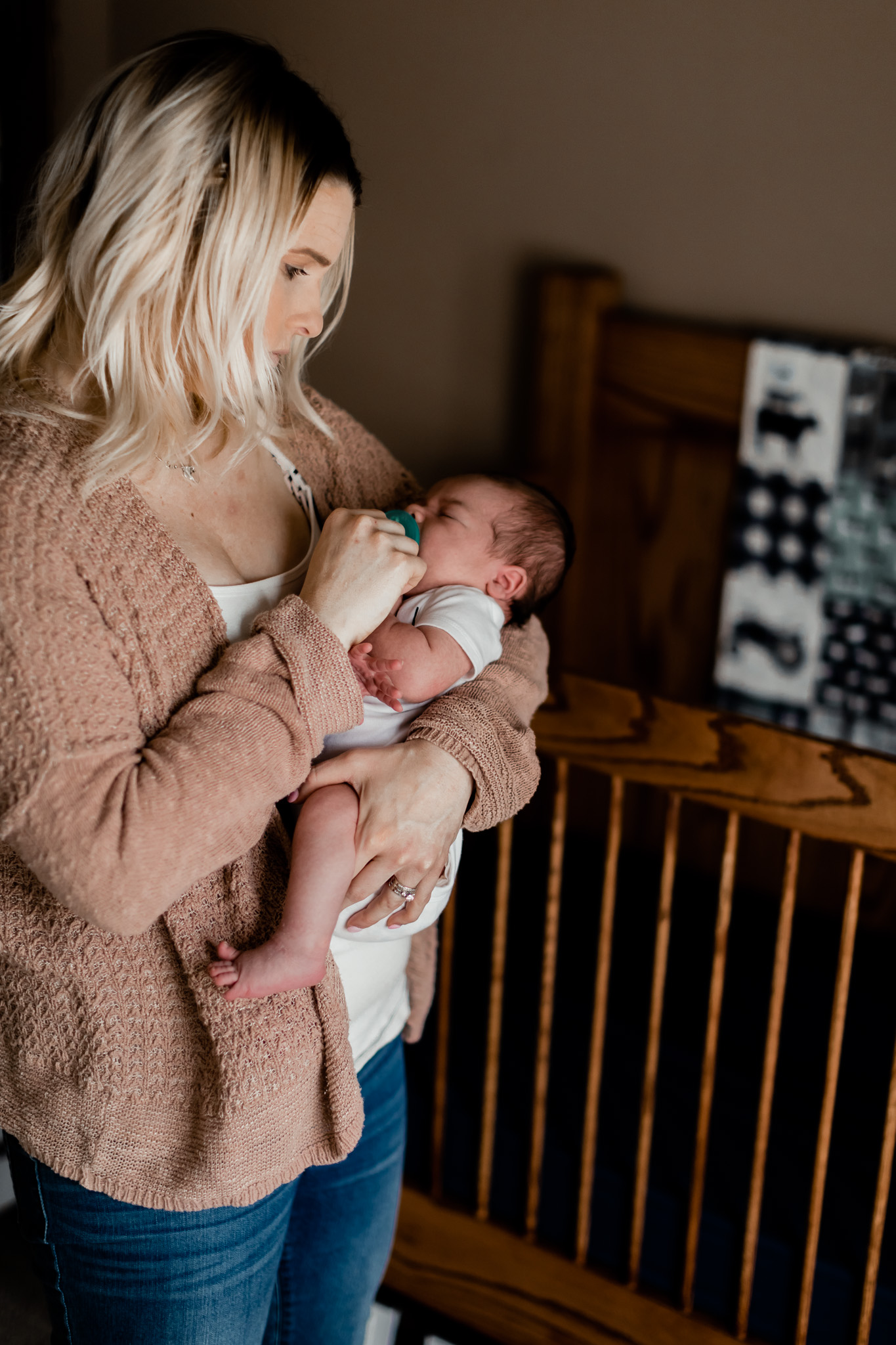 mom holding new baby