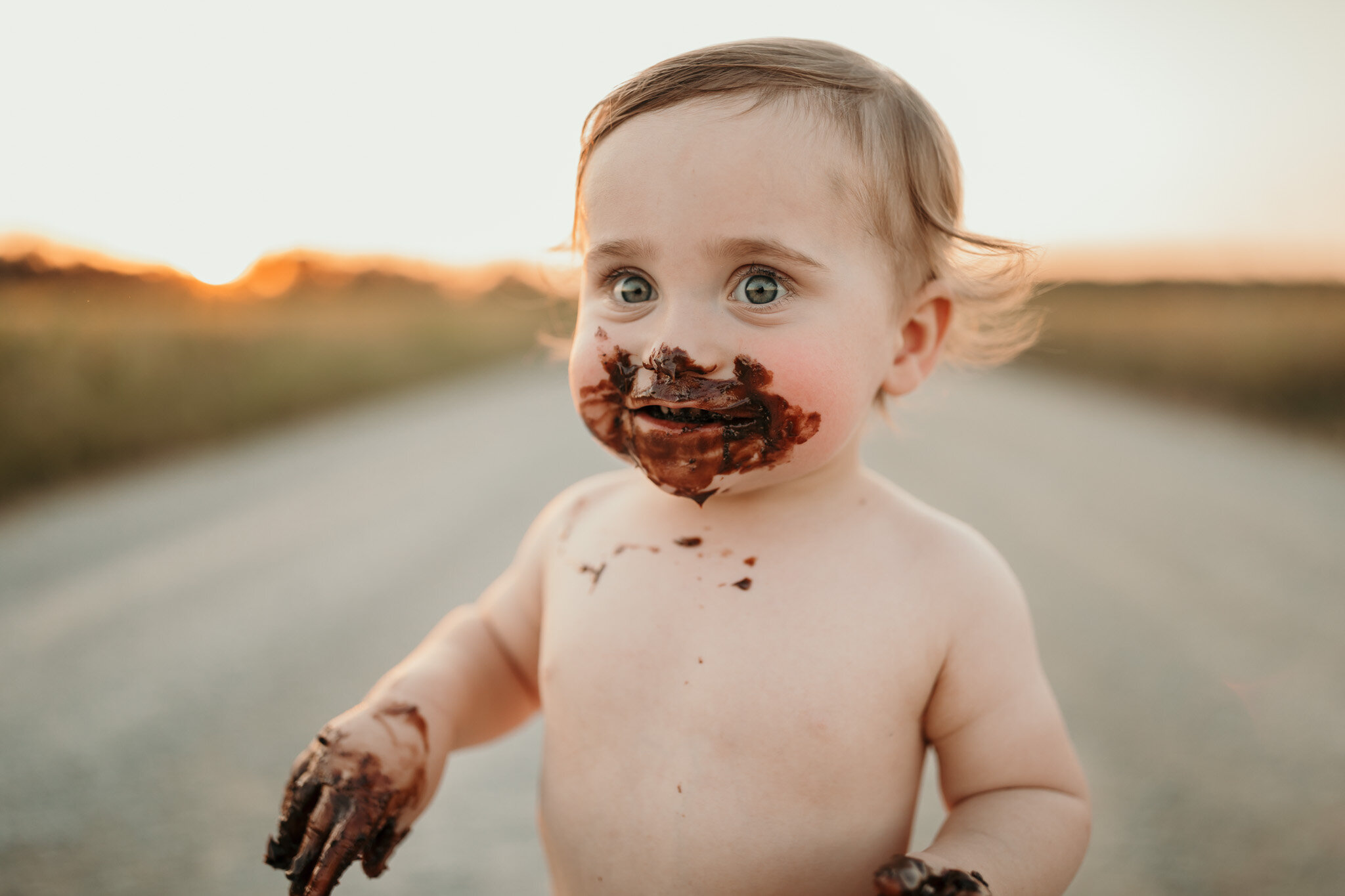 little boy loves birthday cake