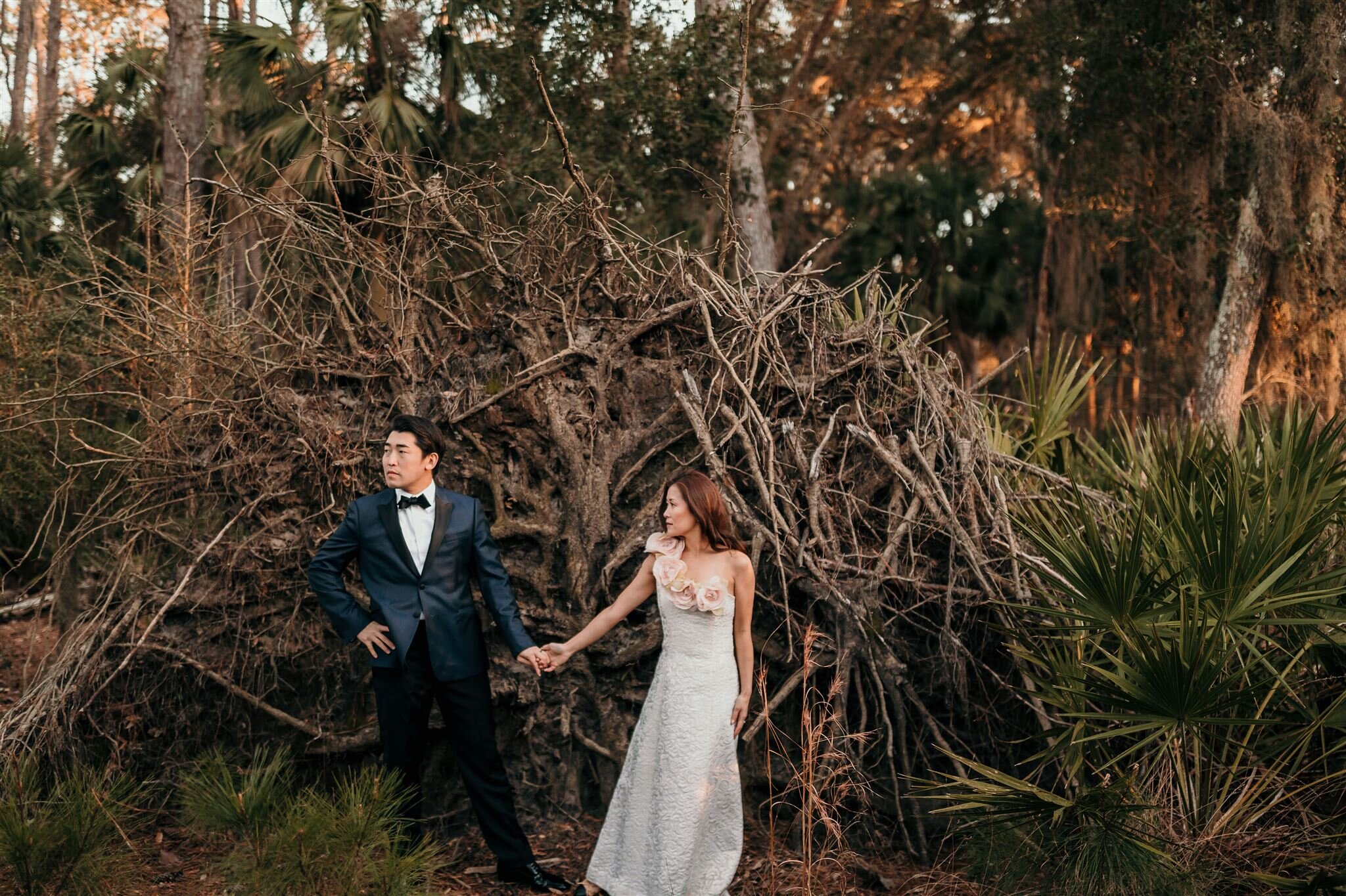 wedding couple savannah ga in front of moss line trees
