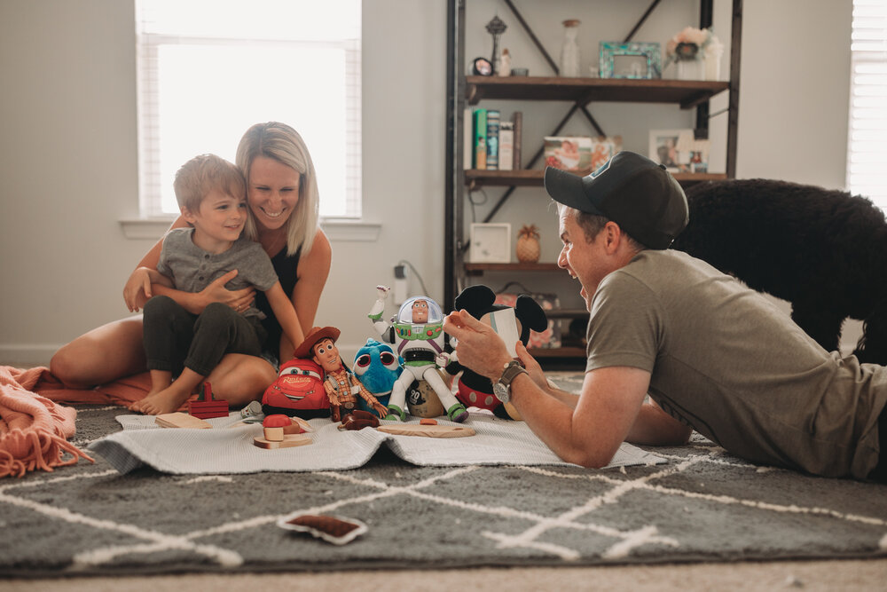 playing with toys on a picnic inside