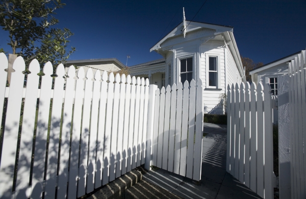 A good neighbor fence makes a home the pride of the neighborhood.