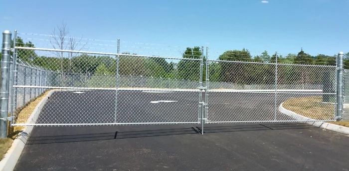 This gate has to be opened and closed by the driver at every entry and exit, making security lapses much more likely.