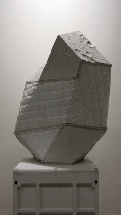 animate gif showing the message "thinking of you" scrolling in the quilted areas as it wraps around the lunar rock sculpture