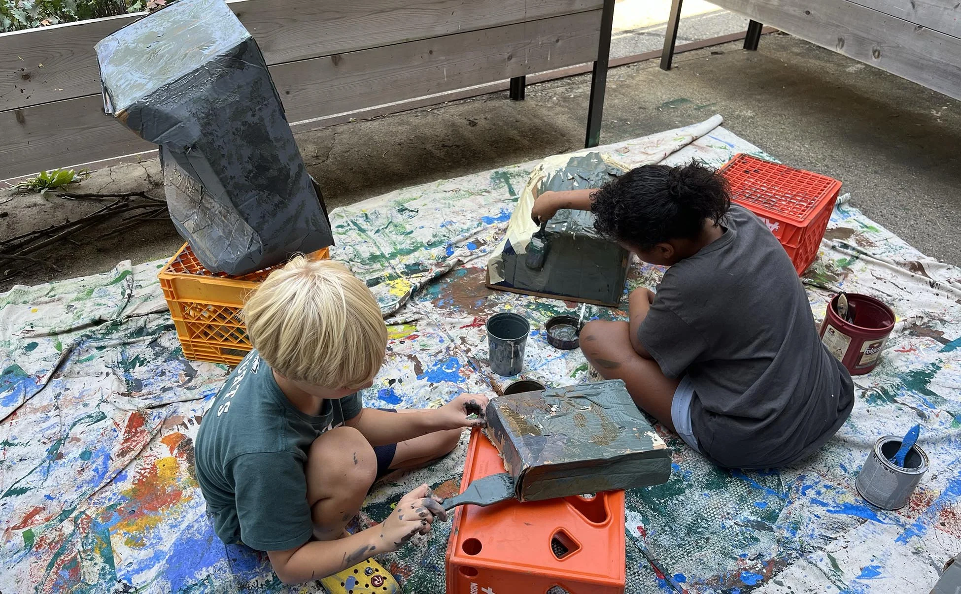   We made our own Wissahickon schist by hammering boxes, painting them, sponging on moss and lichen, and gluing on tin foil and glitter to be sparkling mica.  