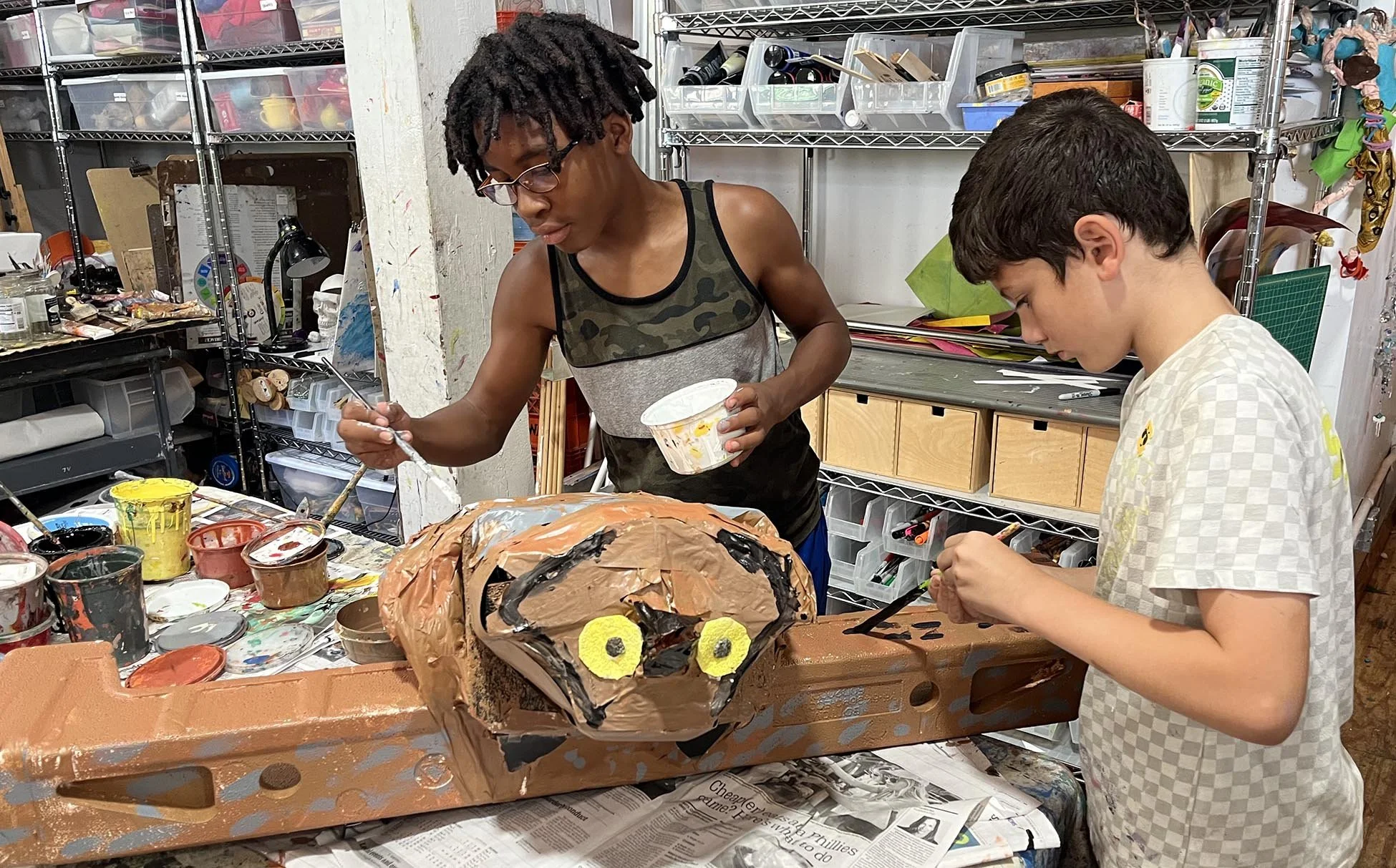   We were all amazed by seeing the step-by-step process Jelani and Calder used to turn styrofoam packing pieces into a great horned owl.  