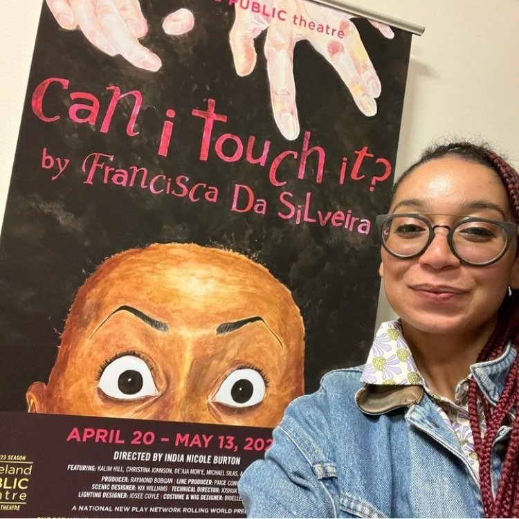  Francisca with the poster for Cleveland Public Theatre’s production of “can i touch it?” 