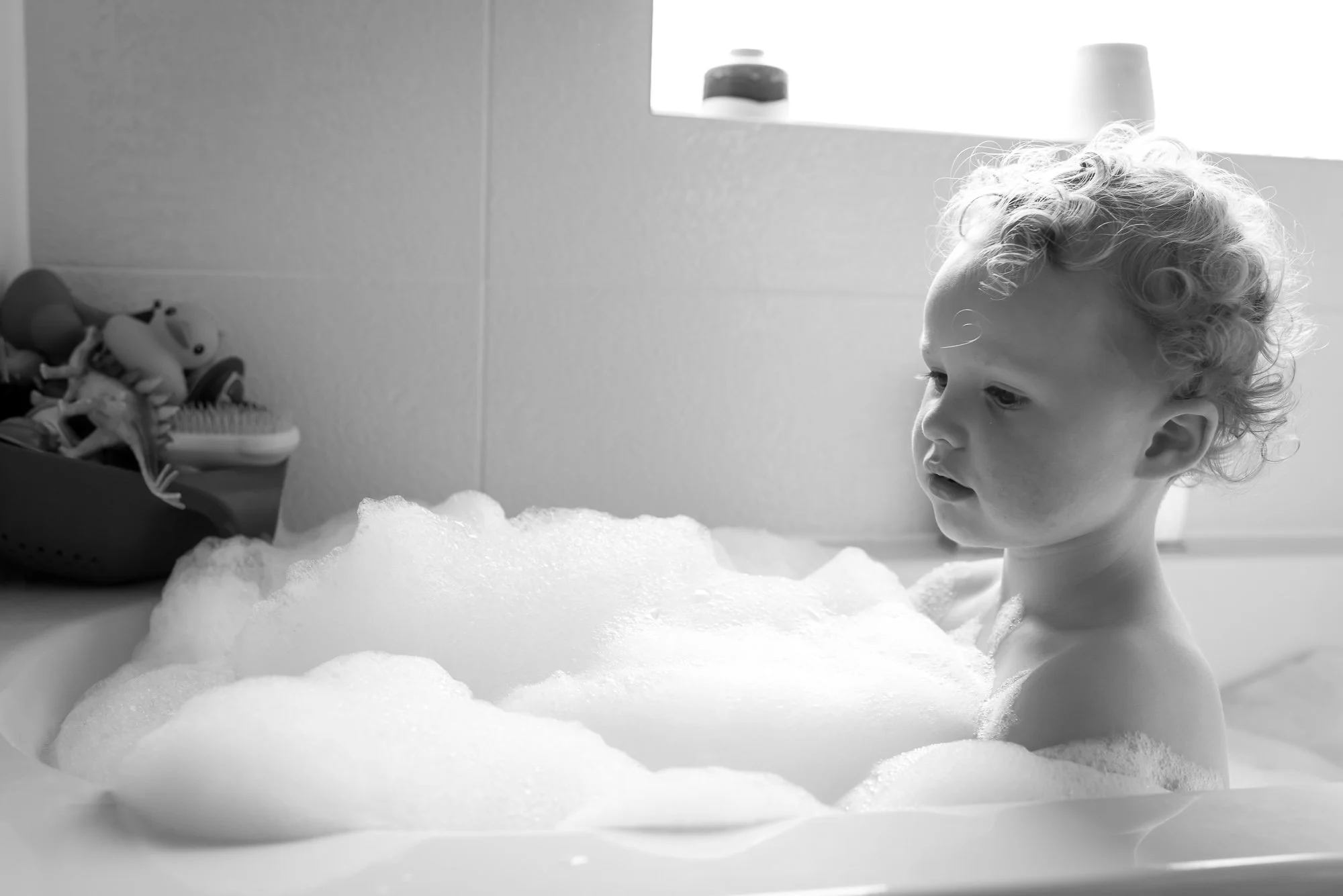 family-documentary-photography-surrey-london-bubbles.jpg