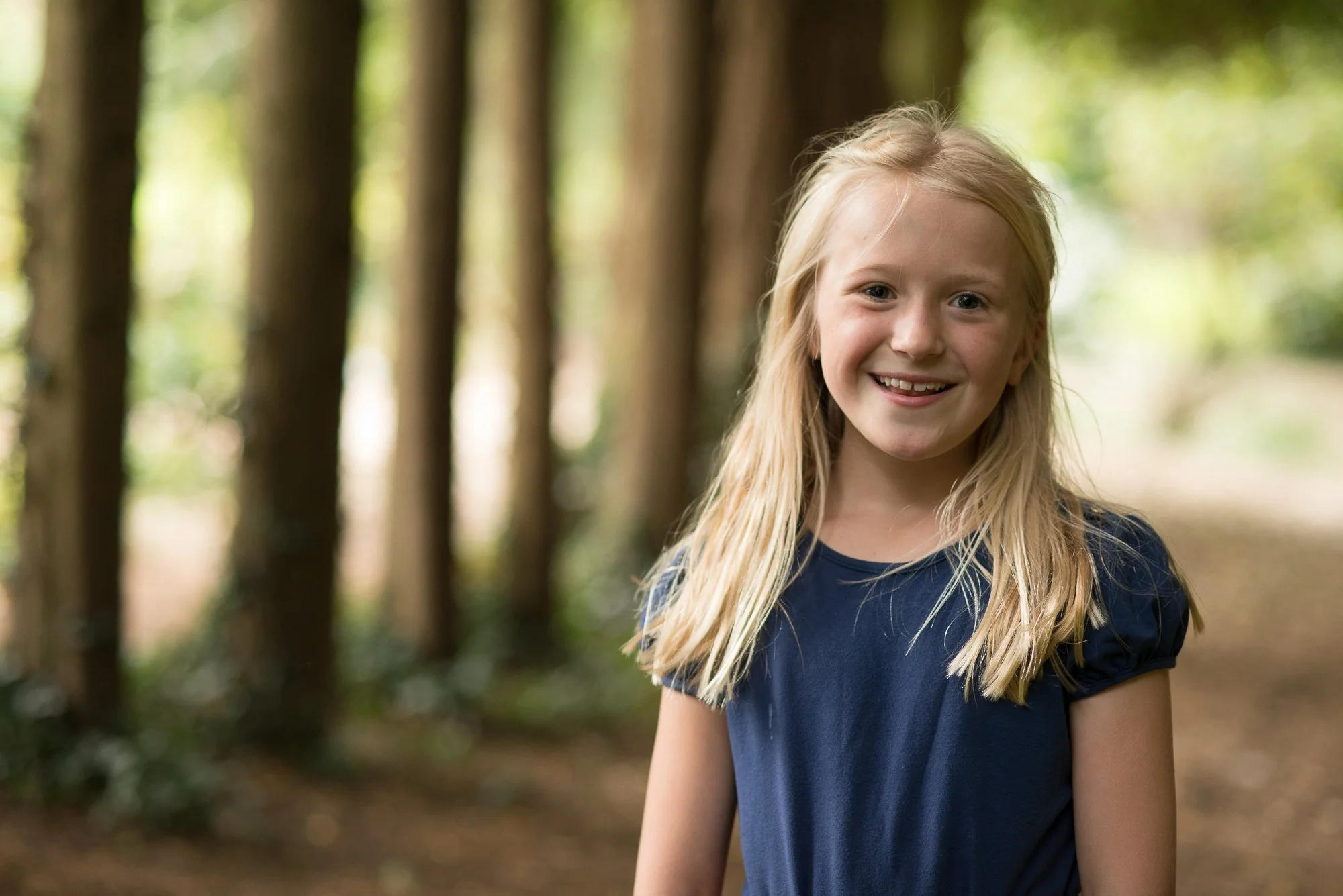 young girl in the woods