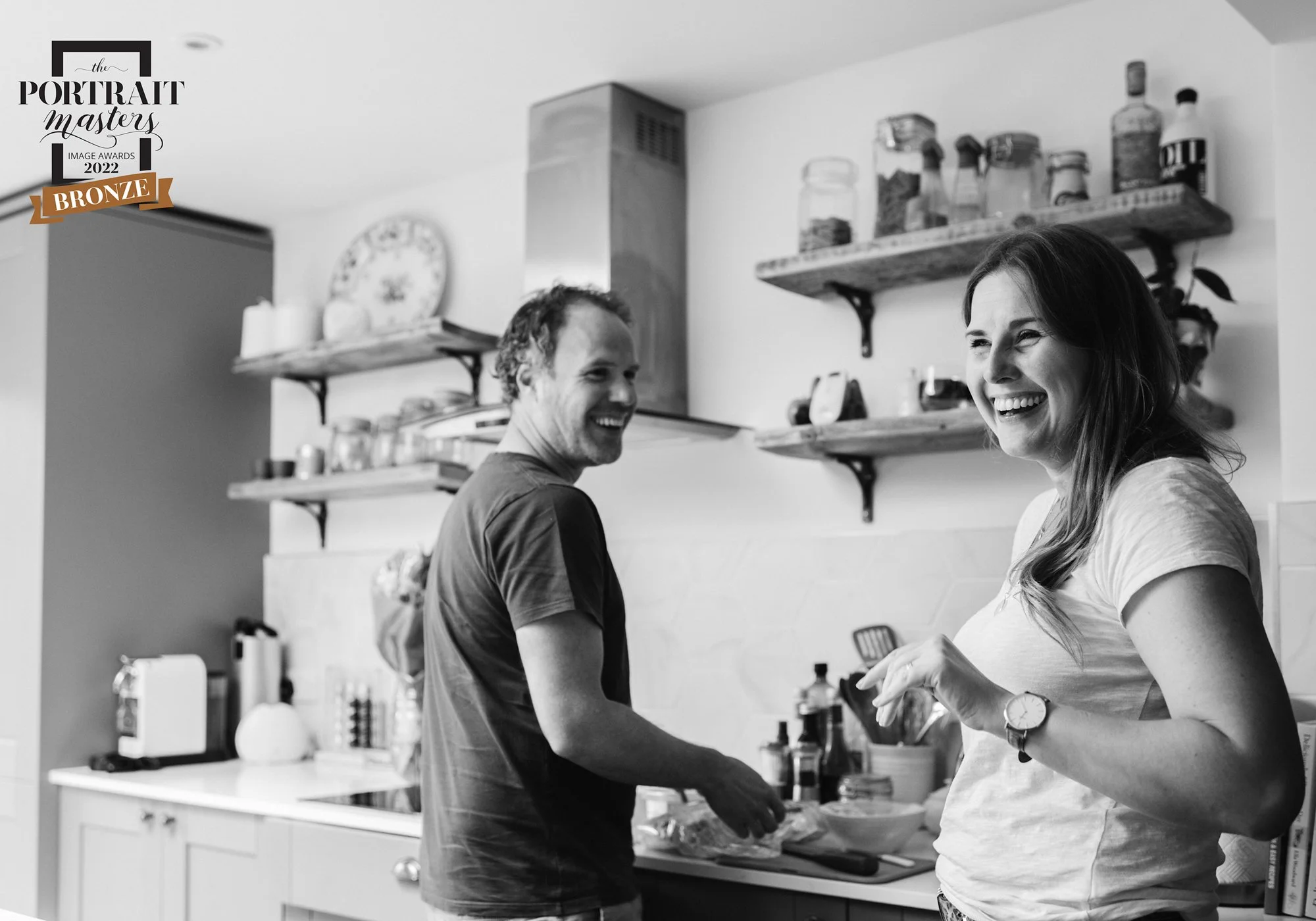 couple in kitchen making breakfast