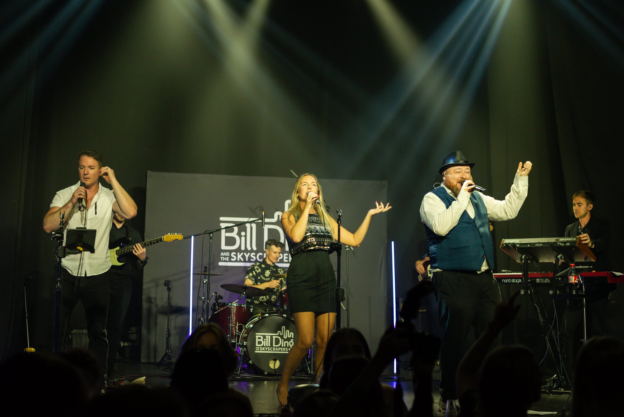 band singing on stage