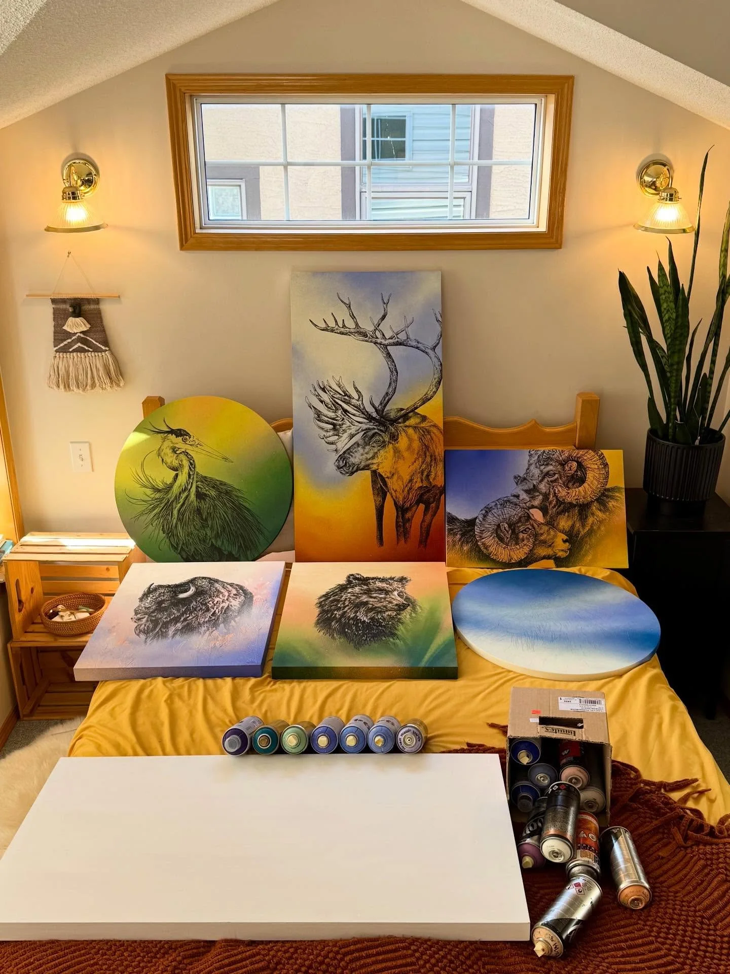 This is how I choose the colour palette for each of my Kin &amp; Glow paintings. I pull out all of my finished pieces, put them on my bed, and then start tossing spray cans onto the comforter as I try to come up with a palette that will suit the indi