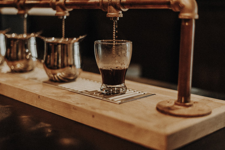 Brass Pour Over Station at Americano Coffee Lounge 434 Houston Street Suite 120 Nashville Tennessee 37203 serving Estate Single Origin AA Coffee.